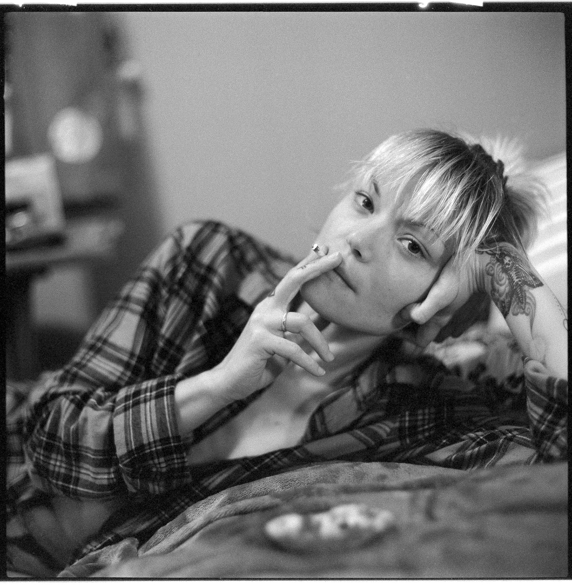 A writer, Anna Christine, in her home. 2018