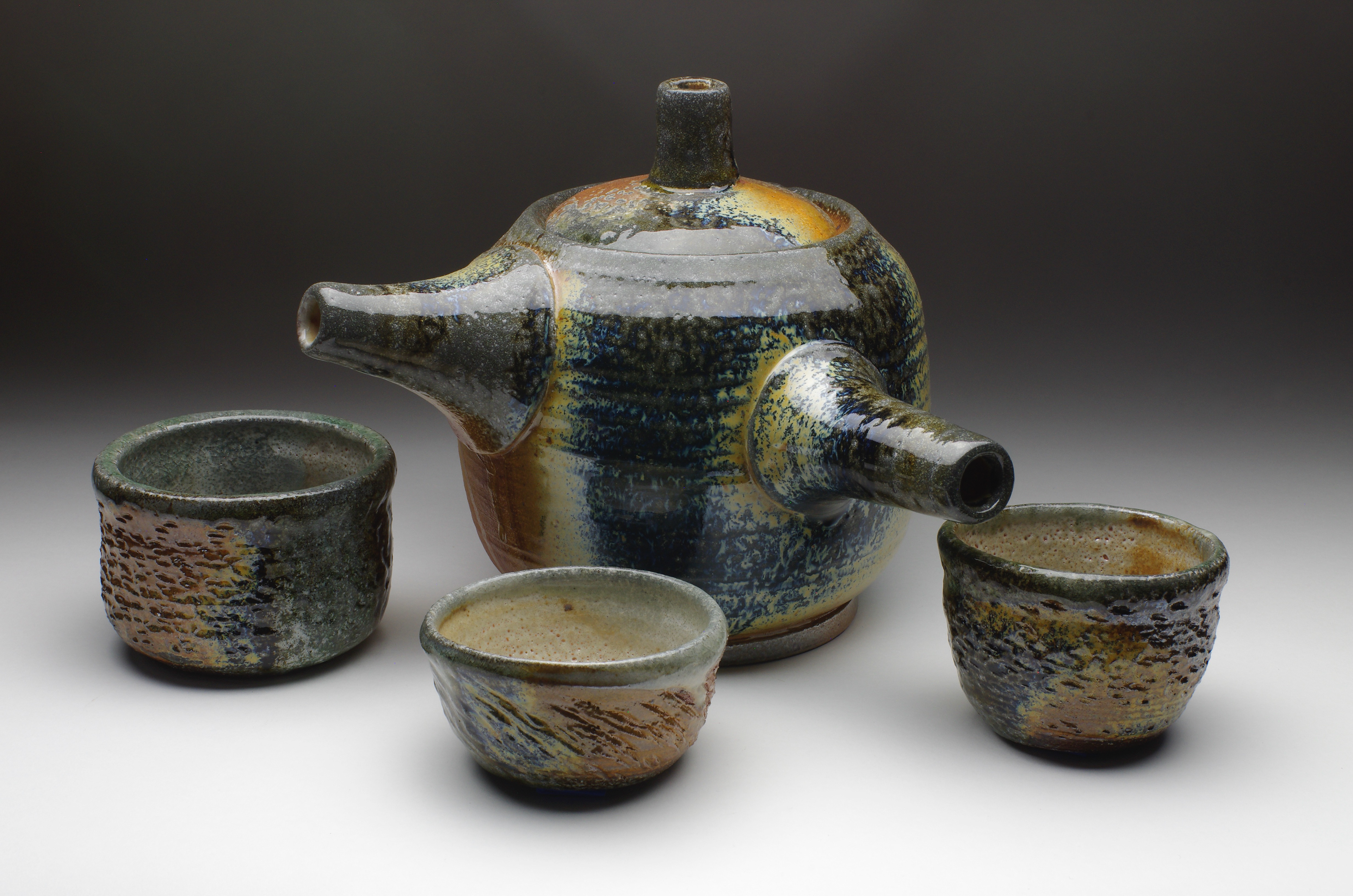 Tea pot and tea bowls, cone 10 gas-soda fired