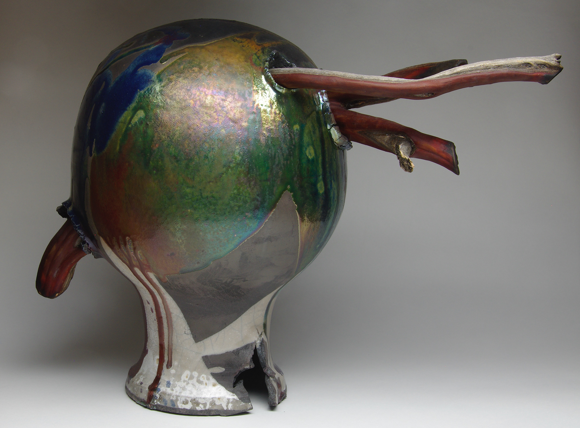 Pierced Planet: wheel thrown and assembled forms, raku fired