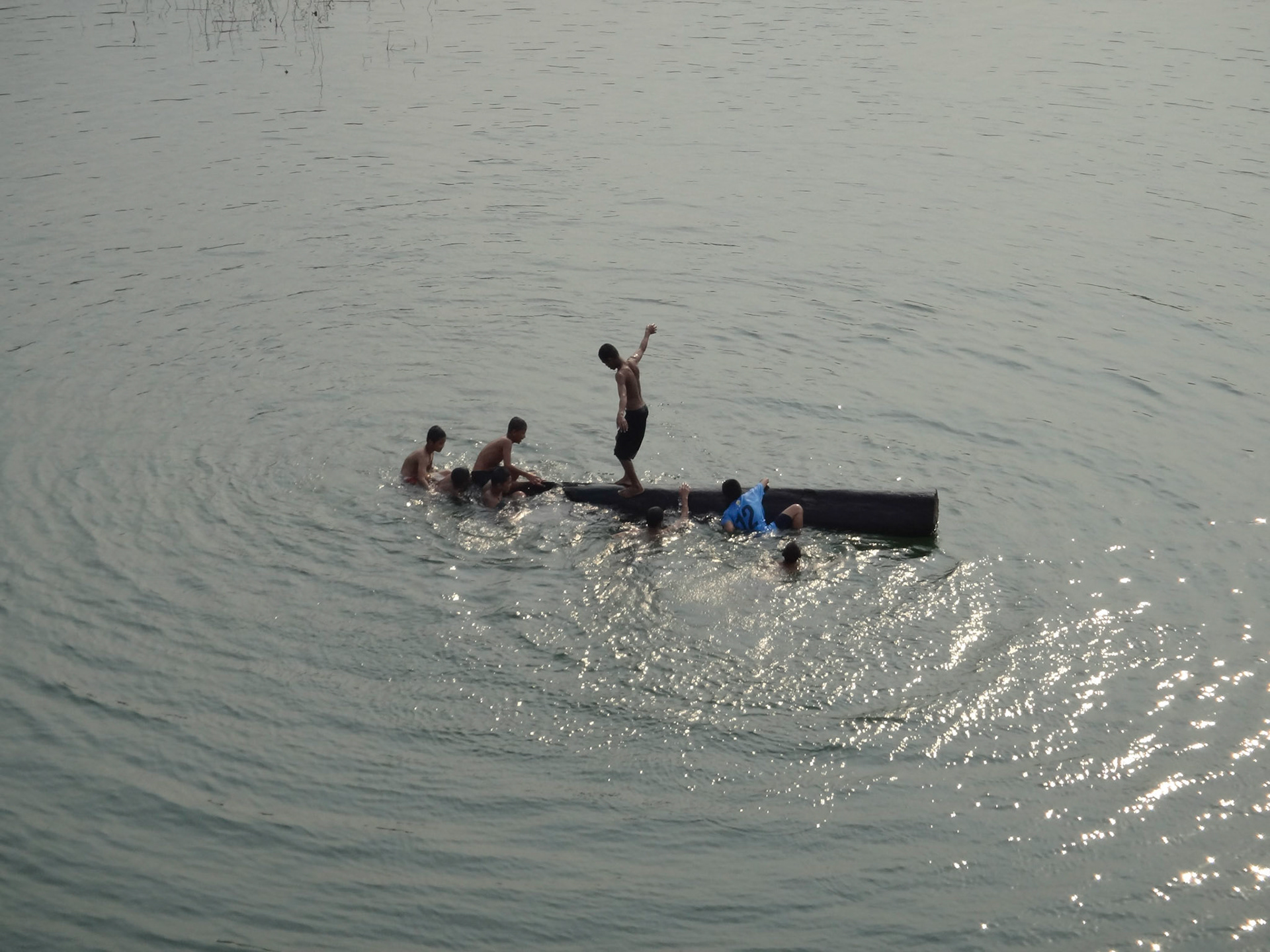 Boys playing, Khao Laem Reservoir, Sangklaburi