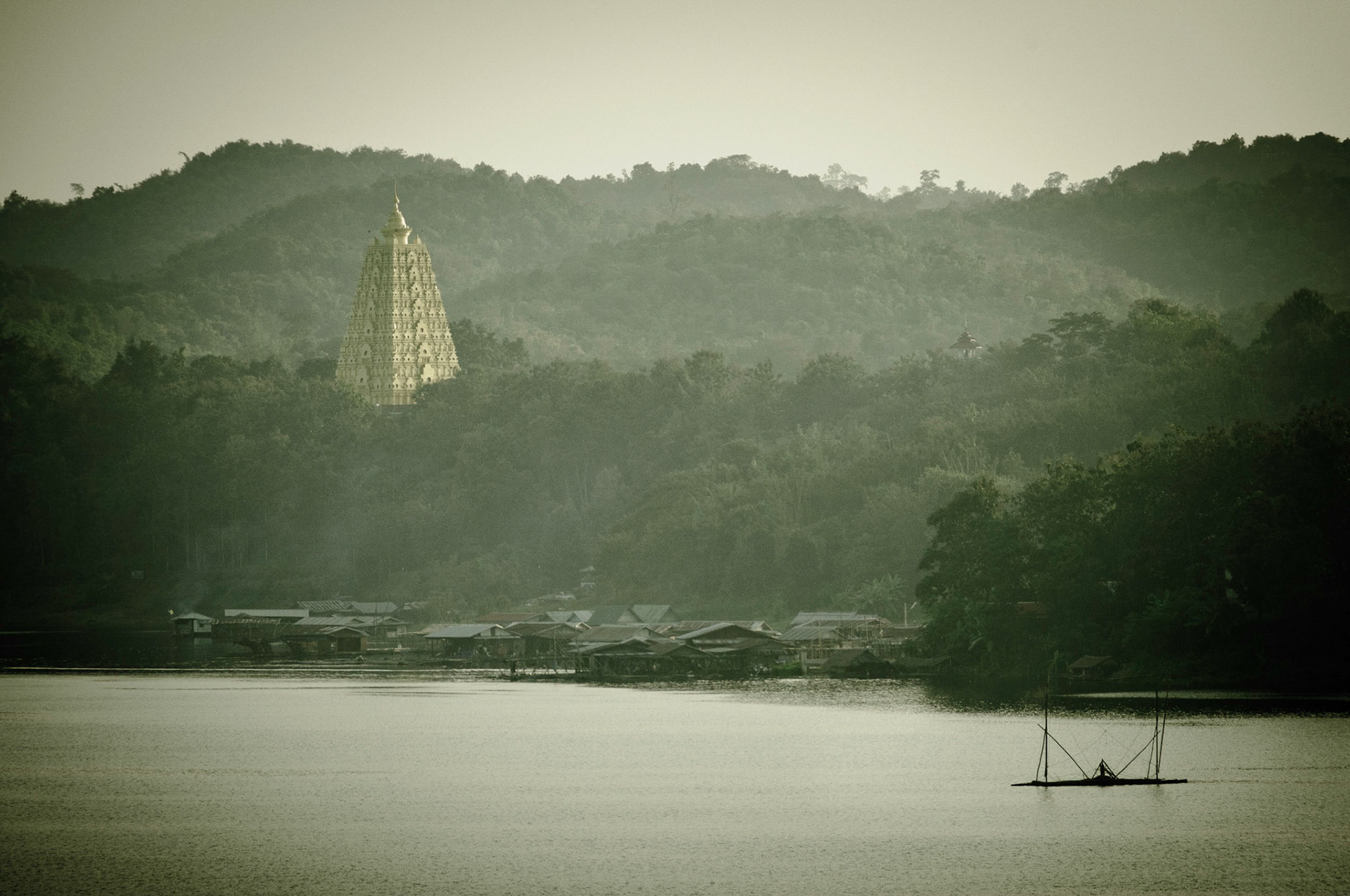 View accross the Khao Laem Reservoir to Chedi Luang Phaw Uttama, Sangklaburi