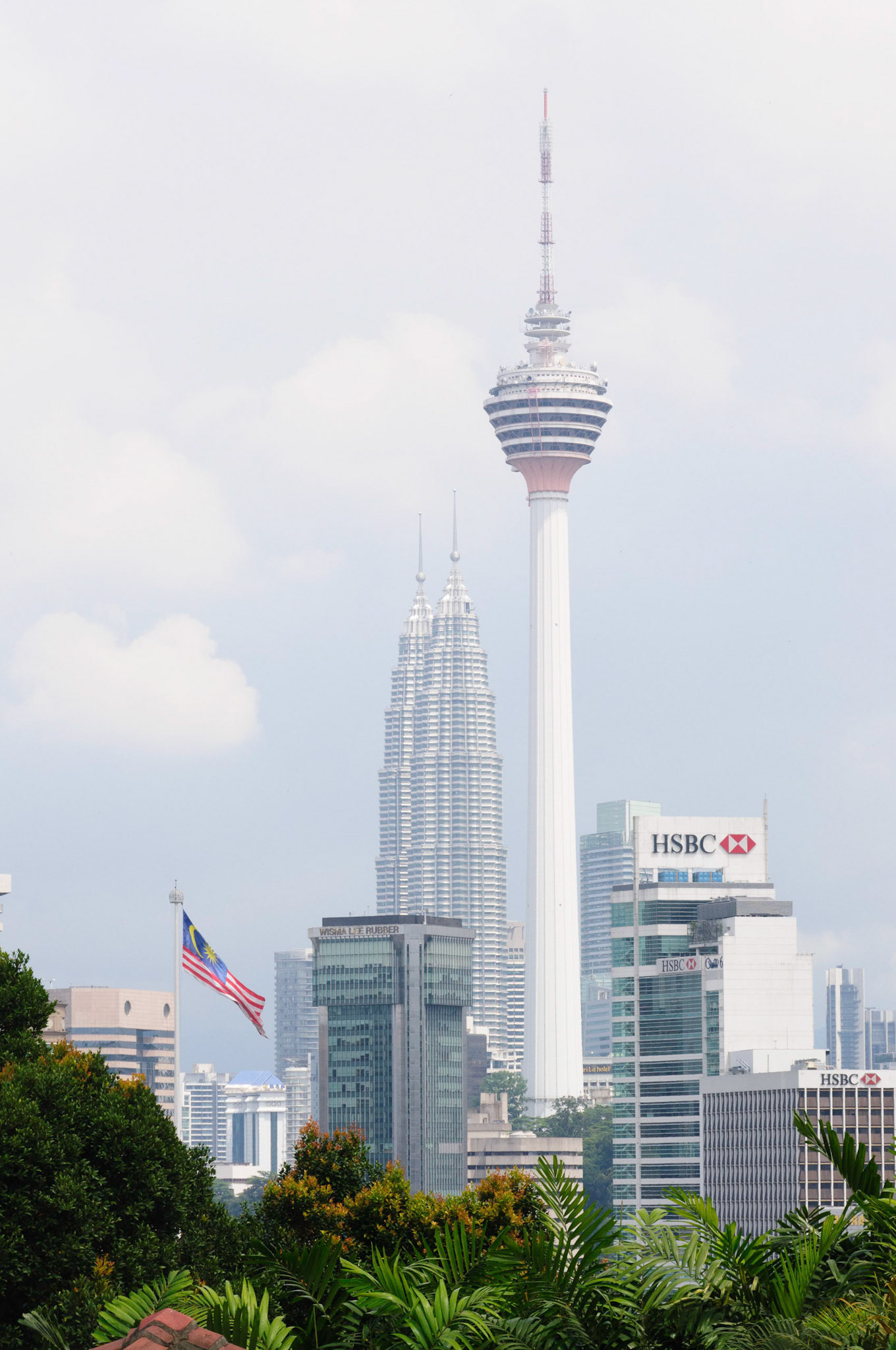 View of the KL Tower and Petronas Towers and one of the tallest flag poles in the world (95 metres)