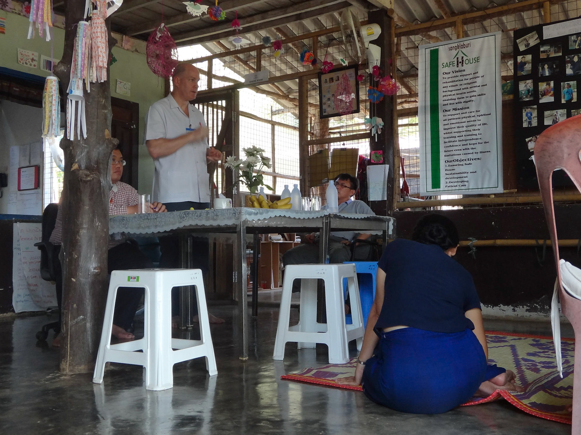 Dr. Scott Murray speaks to the Safe House staff