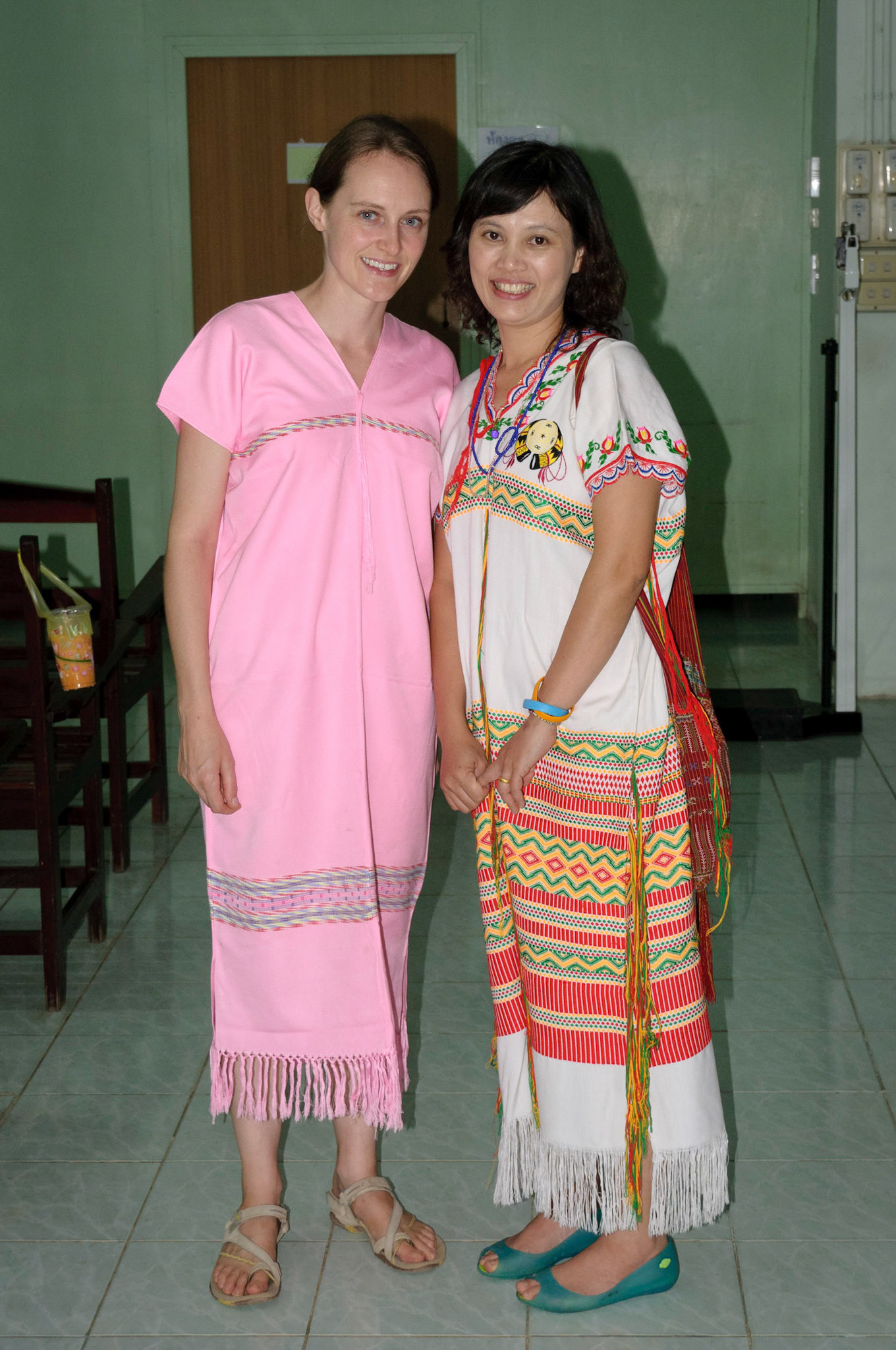 Jen and one of the KRCH staff, in Karen outfits