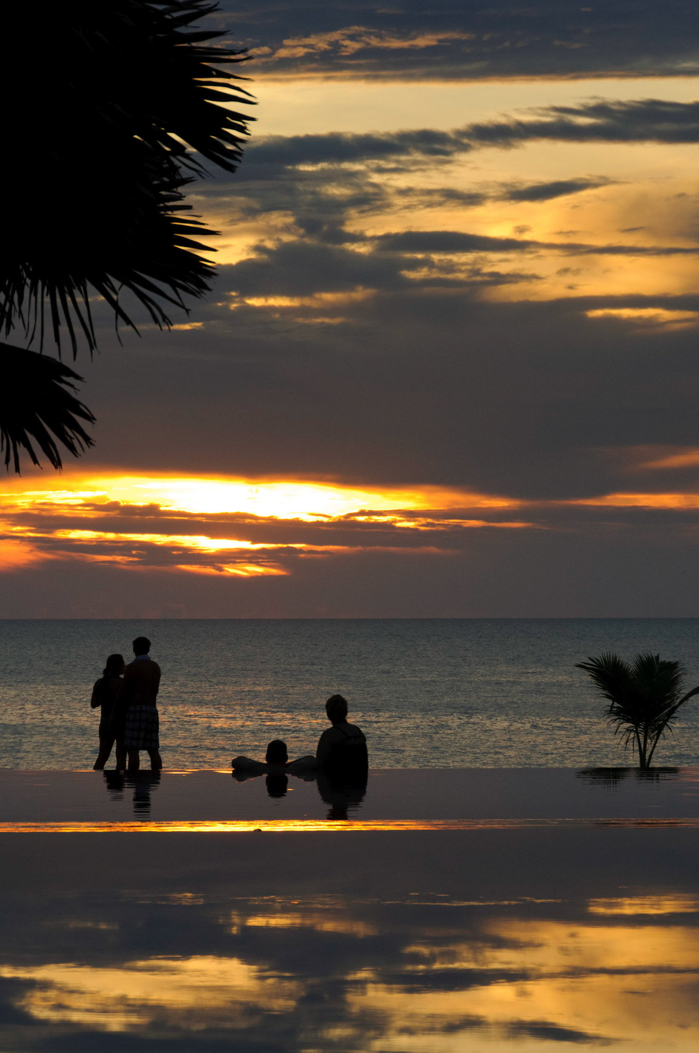 Sunset over the infinity pool at La Flora