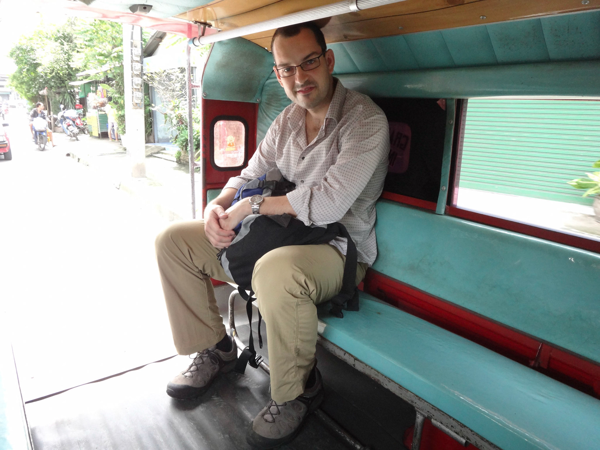 Travelling to language lessons in a Sorng Taa-ou