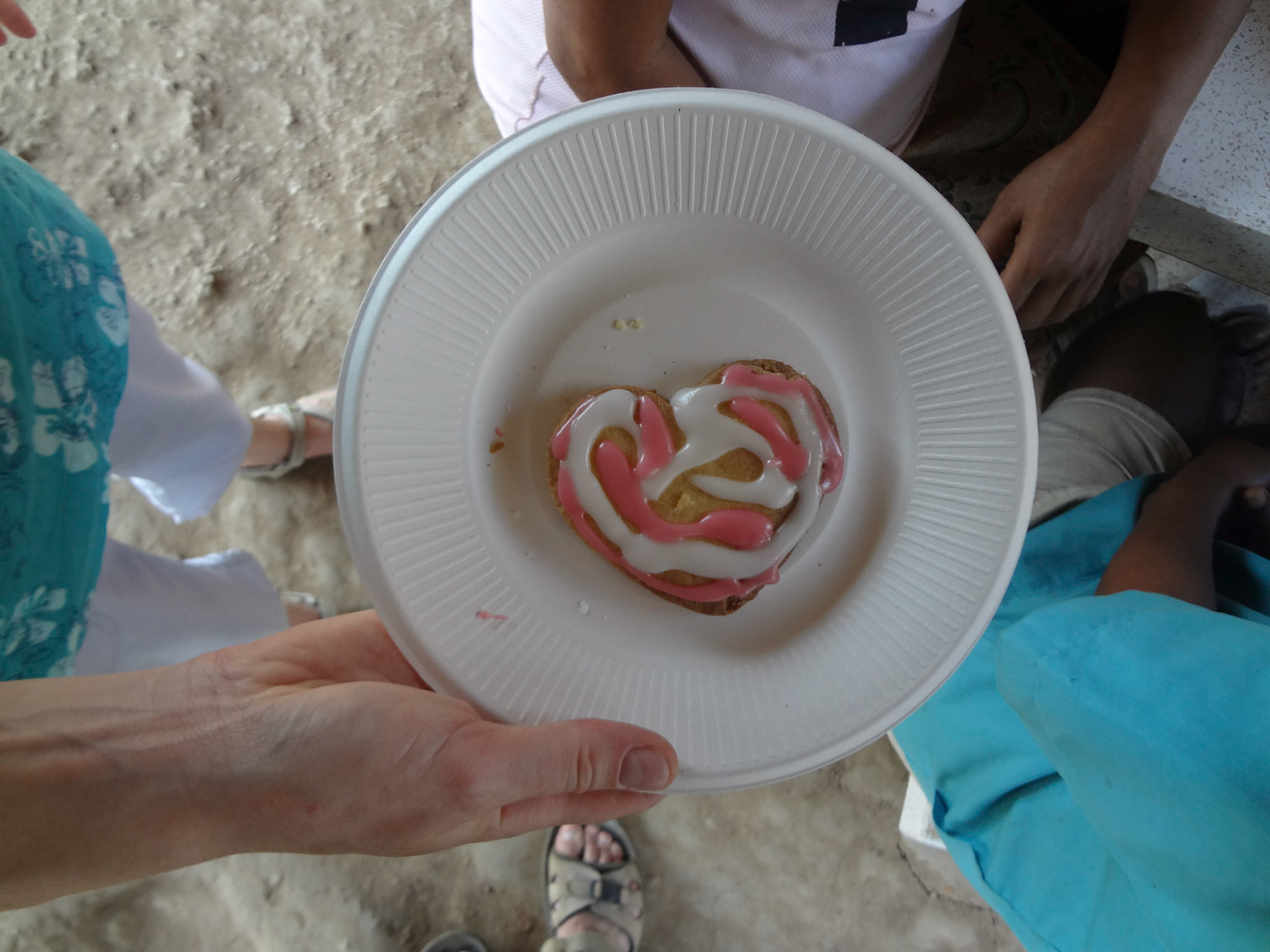 Icing heart-shaped cookies on Valentines Day