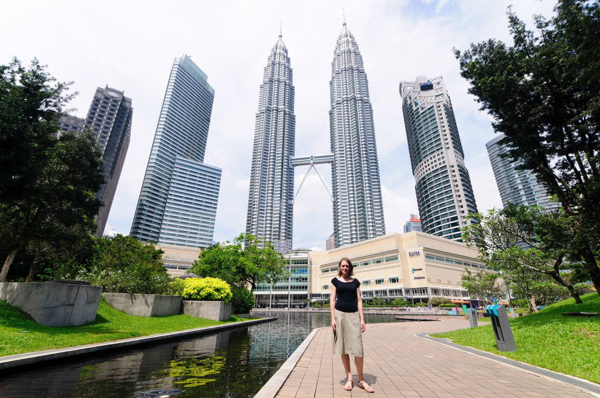 Jen in the Kuala Lumpur City Centre Park, with the Petronas Towers in the background