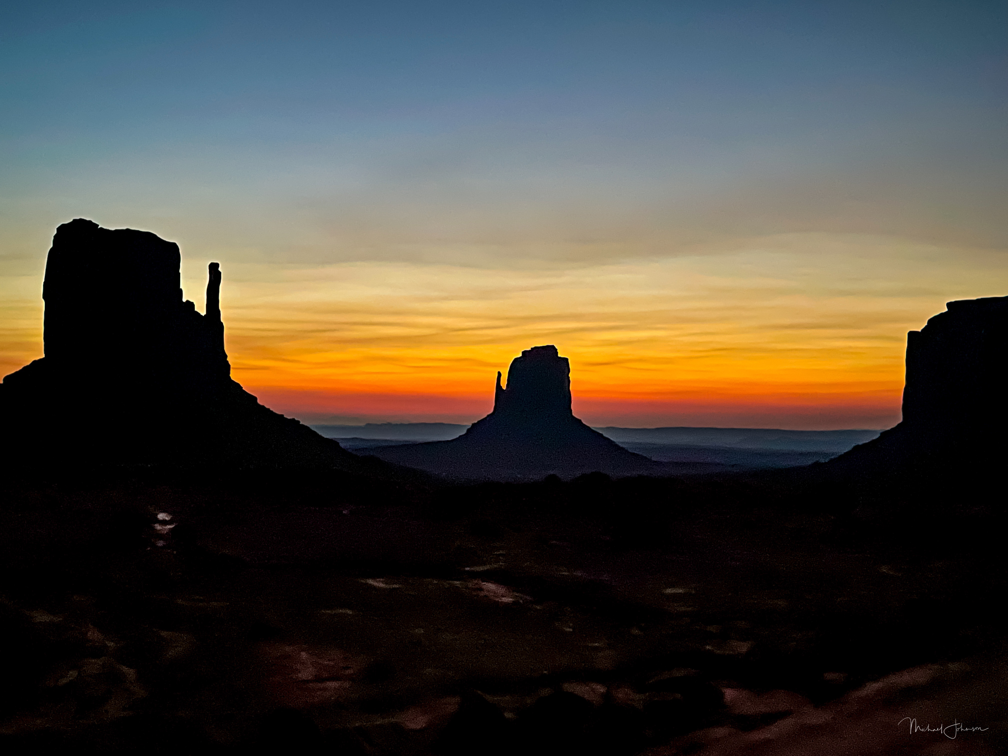 Monument Valley Sunrise - West Mitten Butte, East Mitten Butte, Merrick Butte
