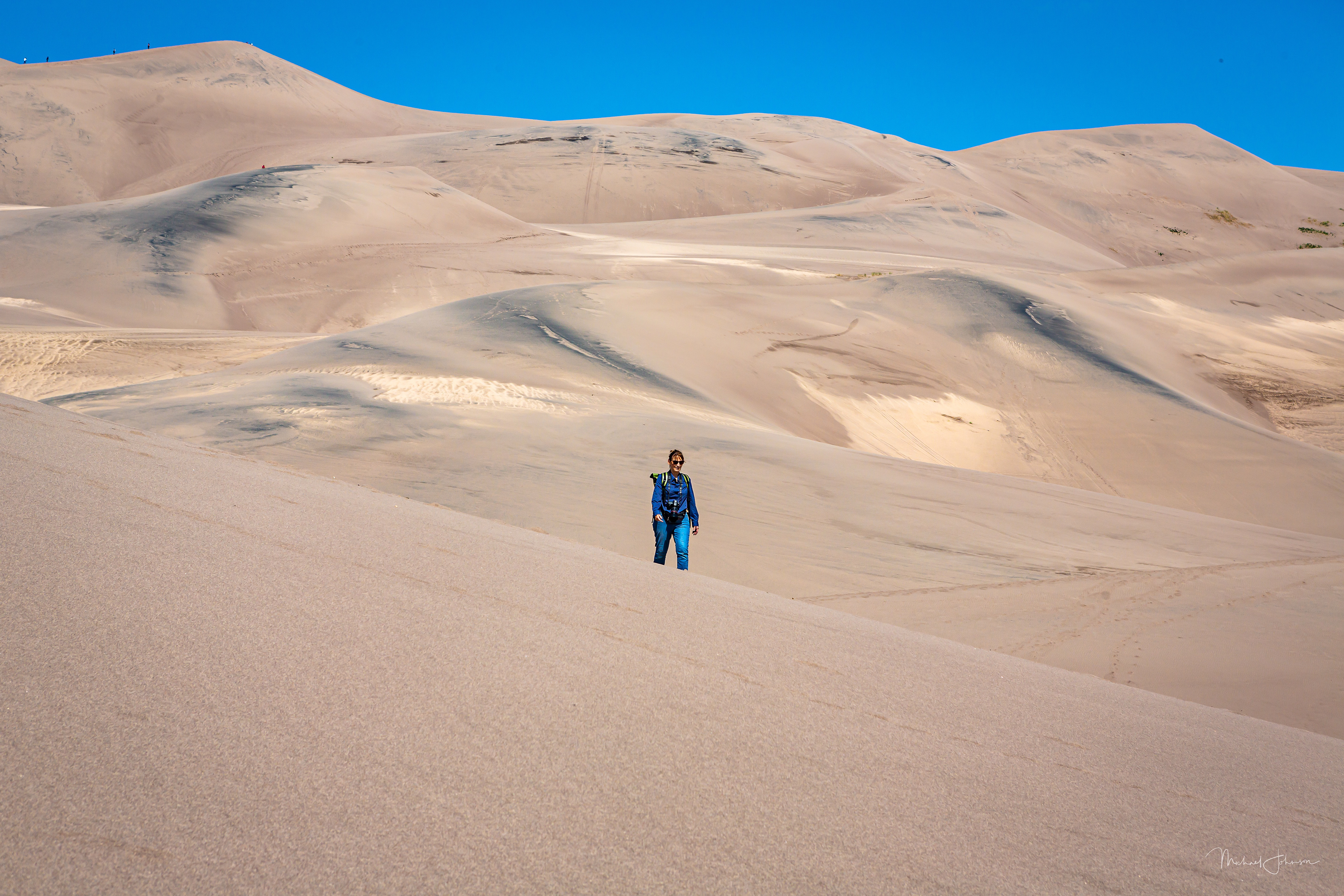 Lauren Climbing the Dunes