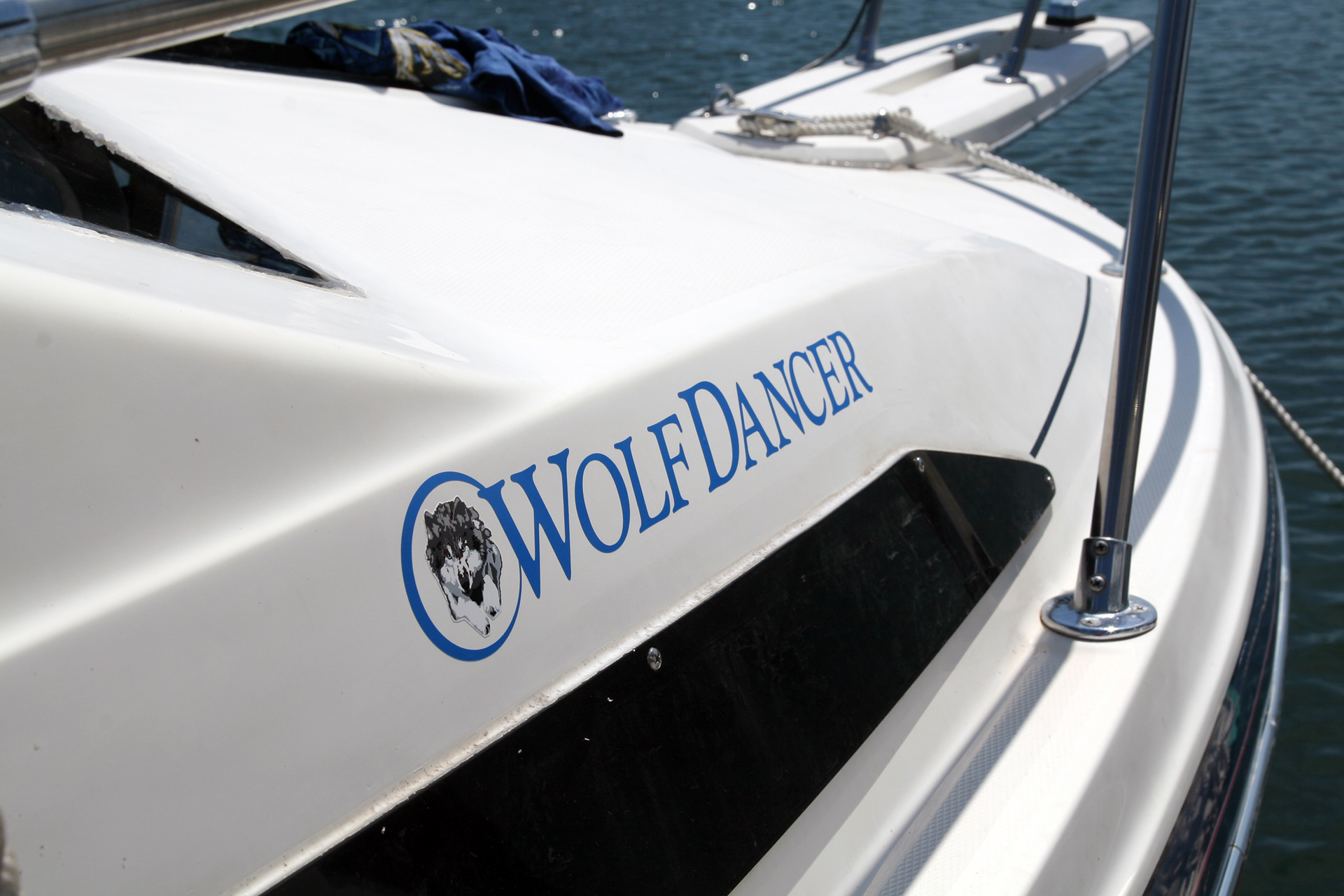 Logo design and graphics produced and installed on a boat.
