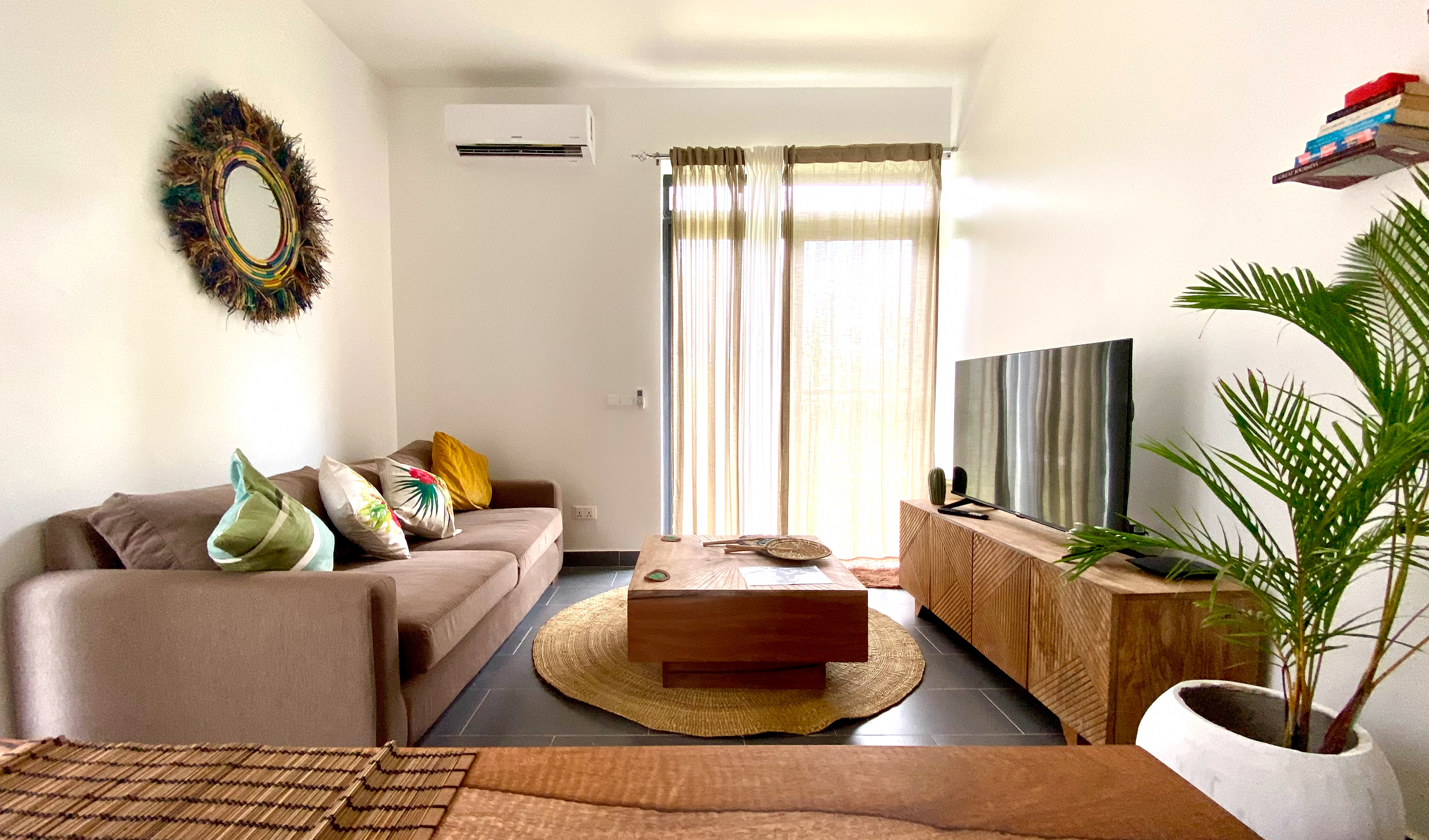 Comfortable living area with 55" TV and reliable WiFi