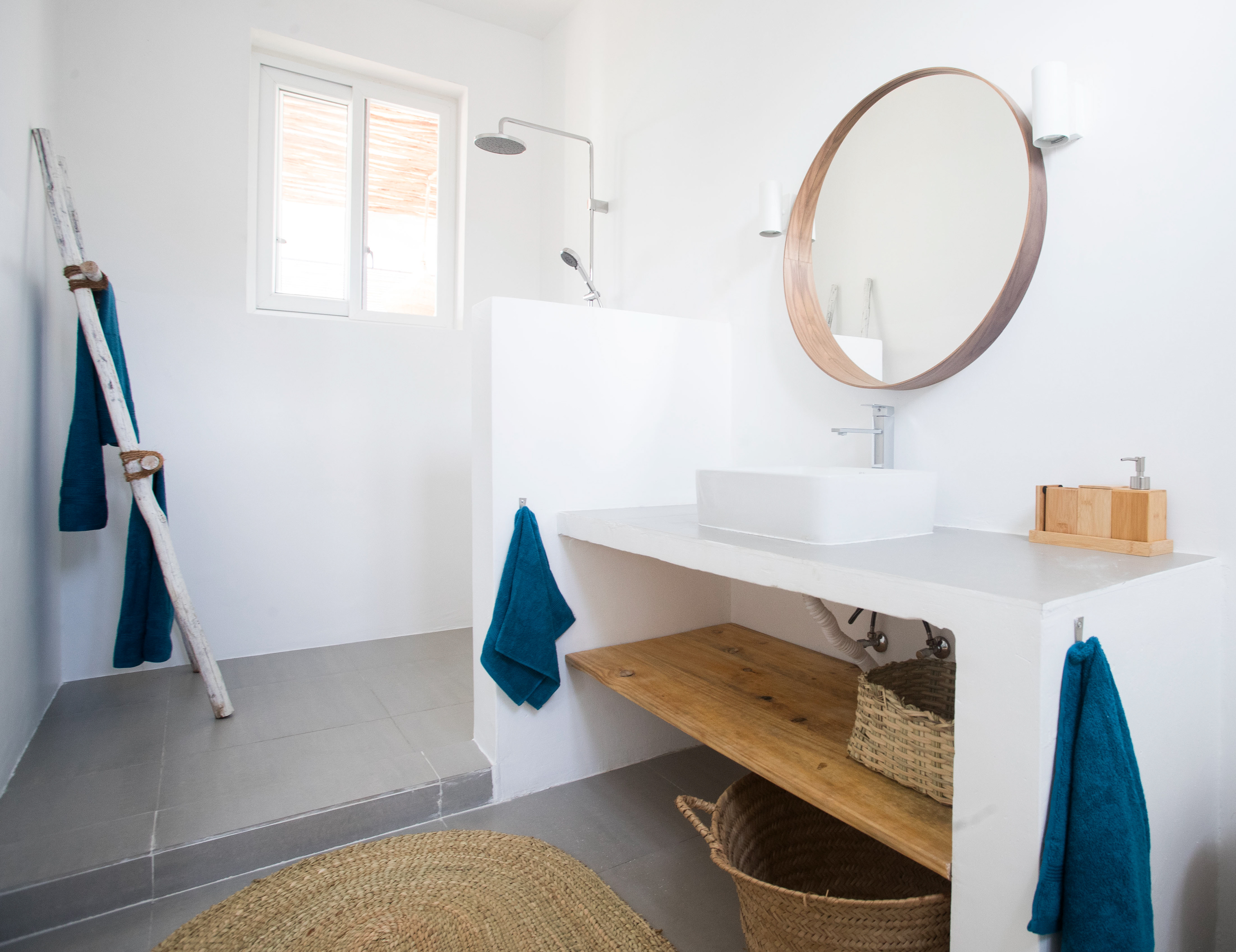 Upstairs bathrooms look out over the sea