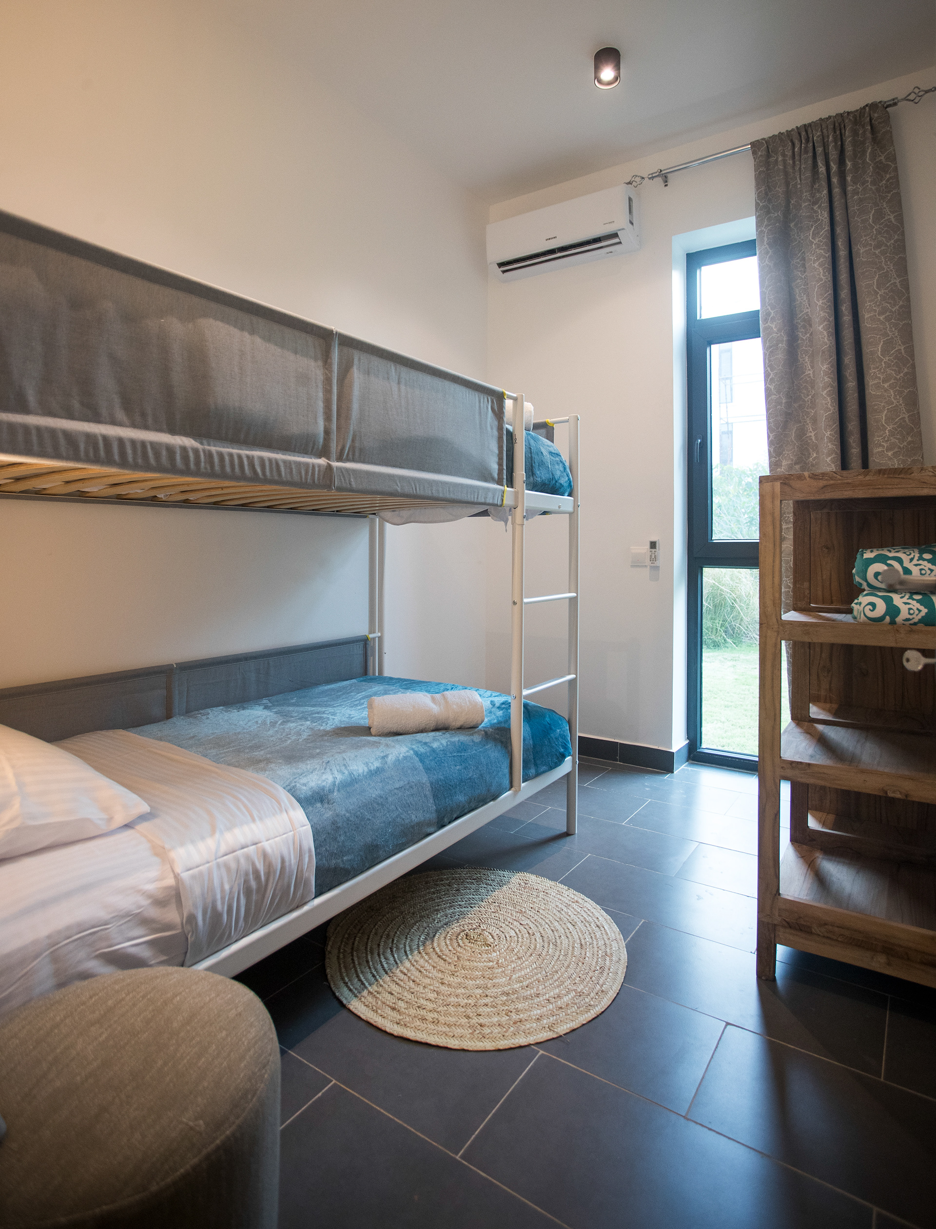 The seconnd bedroom has a bunk bed, perfect for kids