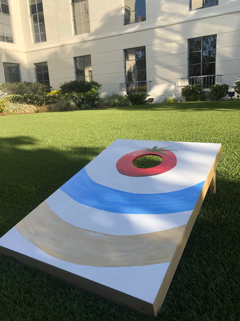 Peter Rabbit 2 x GoldieBlox | Cornhole Board: I hand-painted this Tomato board for a tomato-toss game.