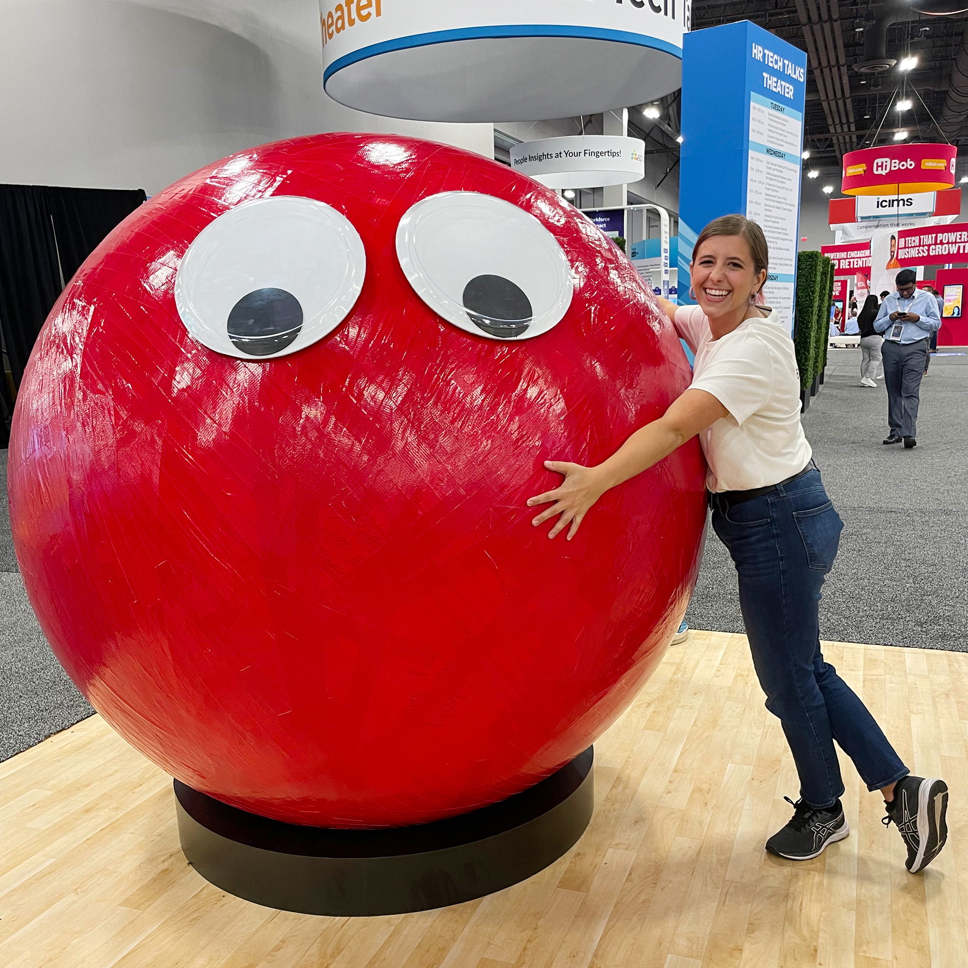 Deel | Giant Tape Ball: I brought Deel's mascot Jake the Ball of Red Tape to life throughout the 2024 HR Tech Conference in Las Vegas. I also utilized my sales and improv skills as I chatted with booth visitors and acted as talent in their livestreams.