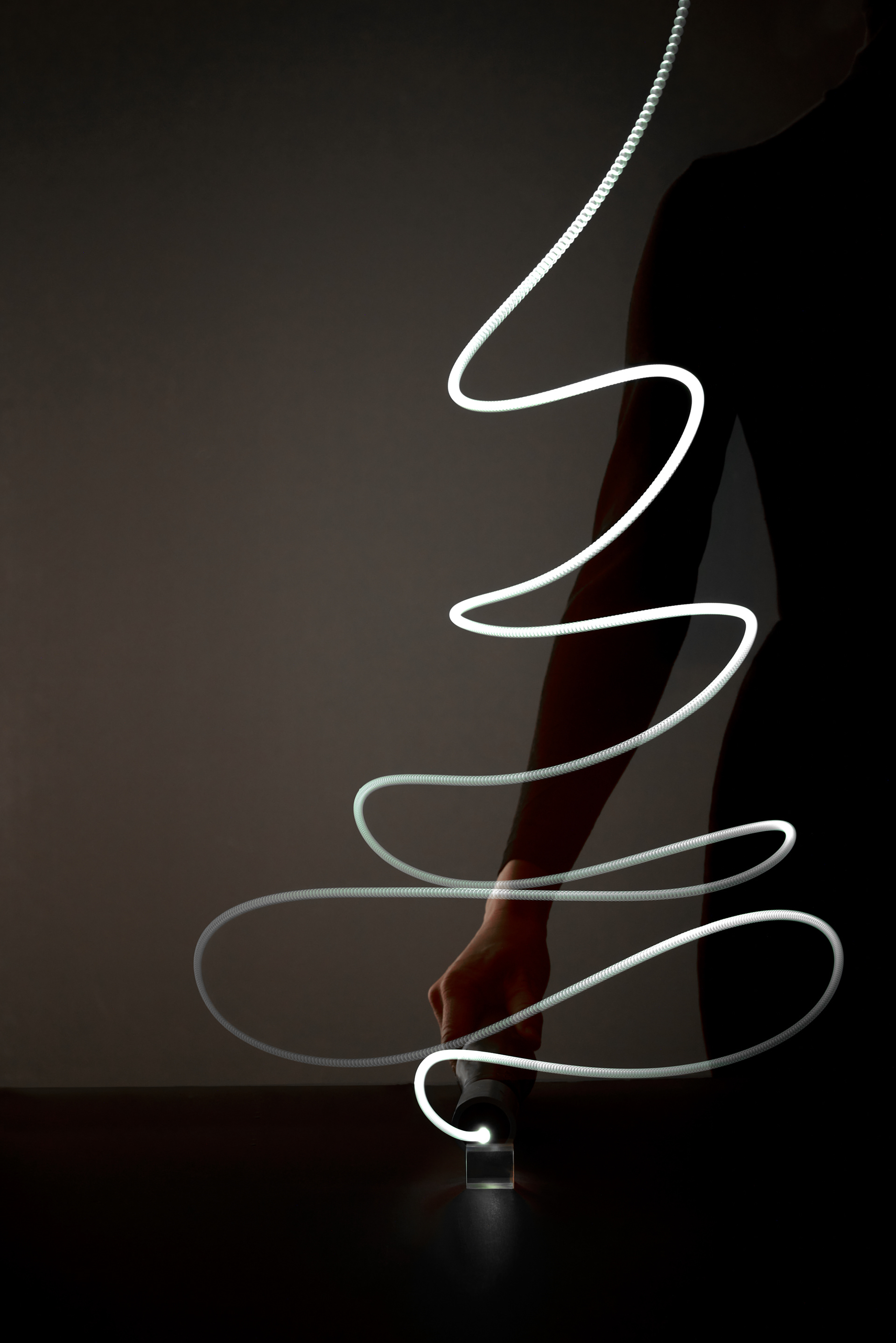 Text message: "The art of light."