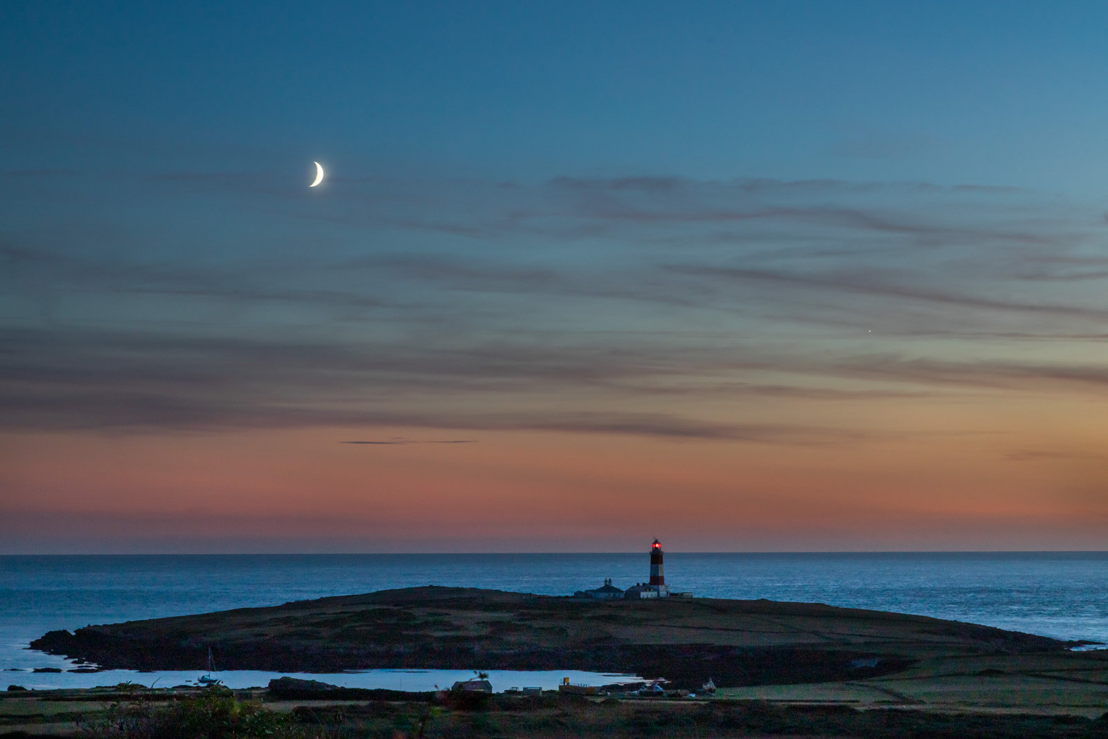 10th Oct 21: The Moon and the post sunset glow around 7p.m.