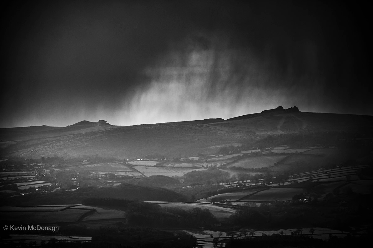 26 March 2021: Rainstorm over Saddle Tor and Haytor from about 15 kms distance