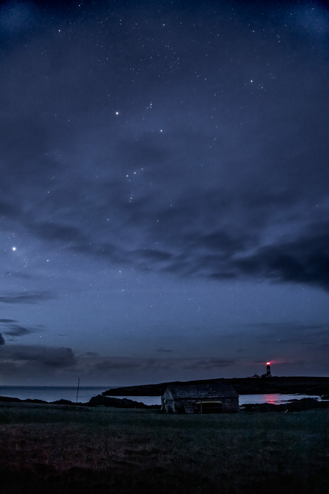 12th October: 6.30a.m. and despite some cloud in the sky there was a delightful view of Orion over the lighthouse with the brightest of the nighttime stars, Sirius prominent in the left of the image.