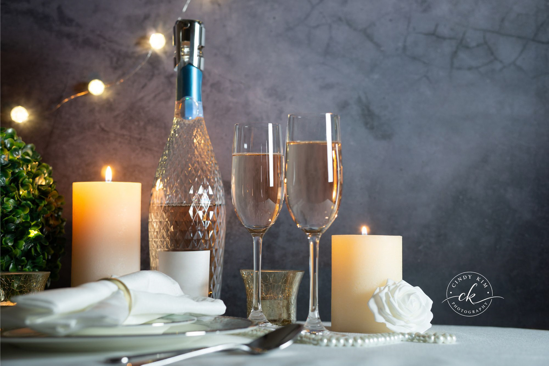 Sparkling Rosé Wine Toast with Candlelight