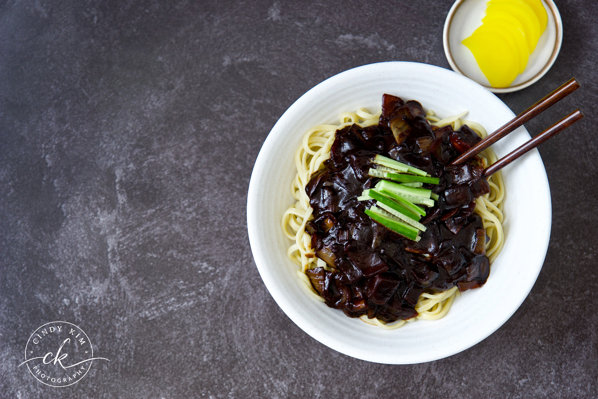 Korean Jajangmyeon Black Bean Noodles with Cucumber Garnish Overhead View