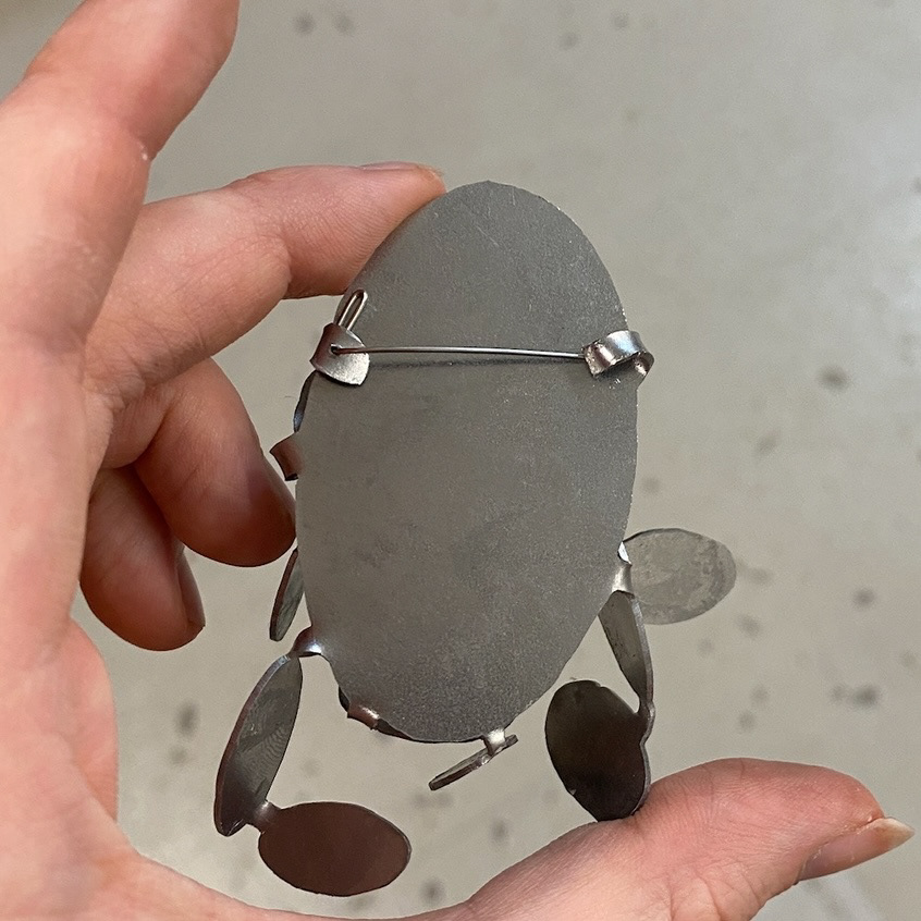 First brooch made