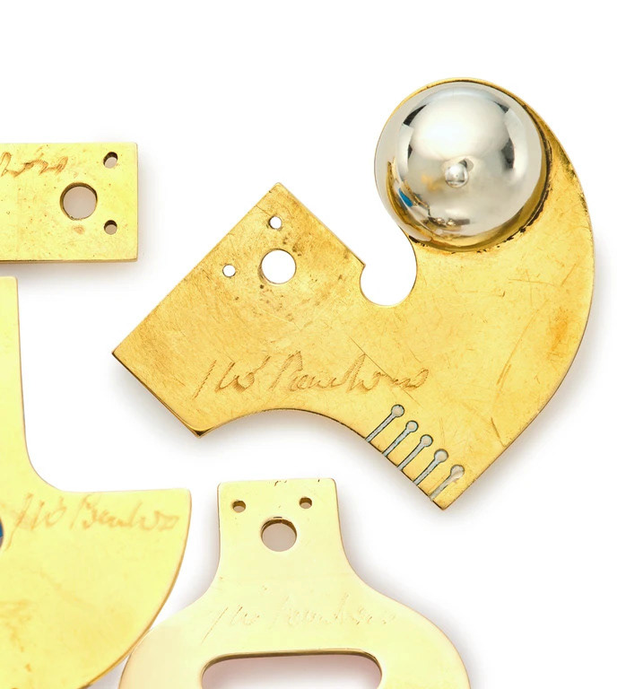 The back of the pieces, showing no counter enamelling was used
