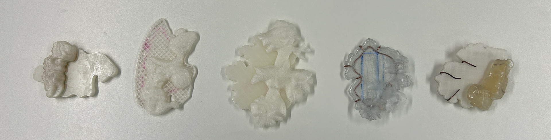 5 brooches
