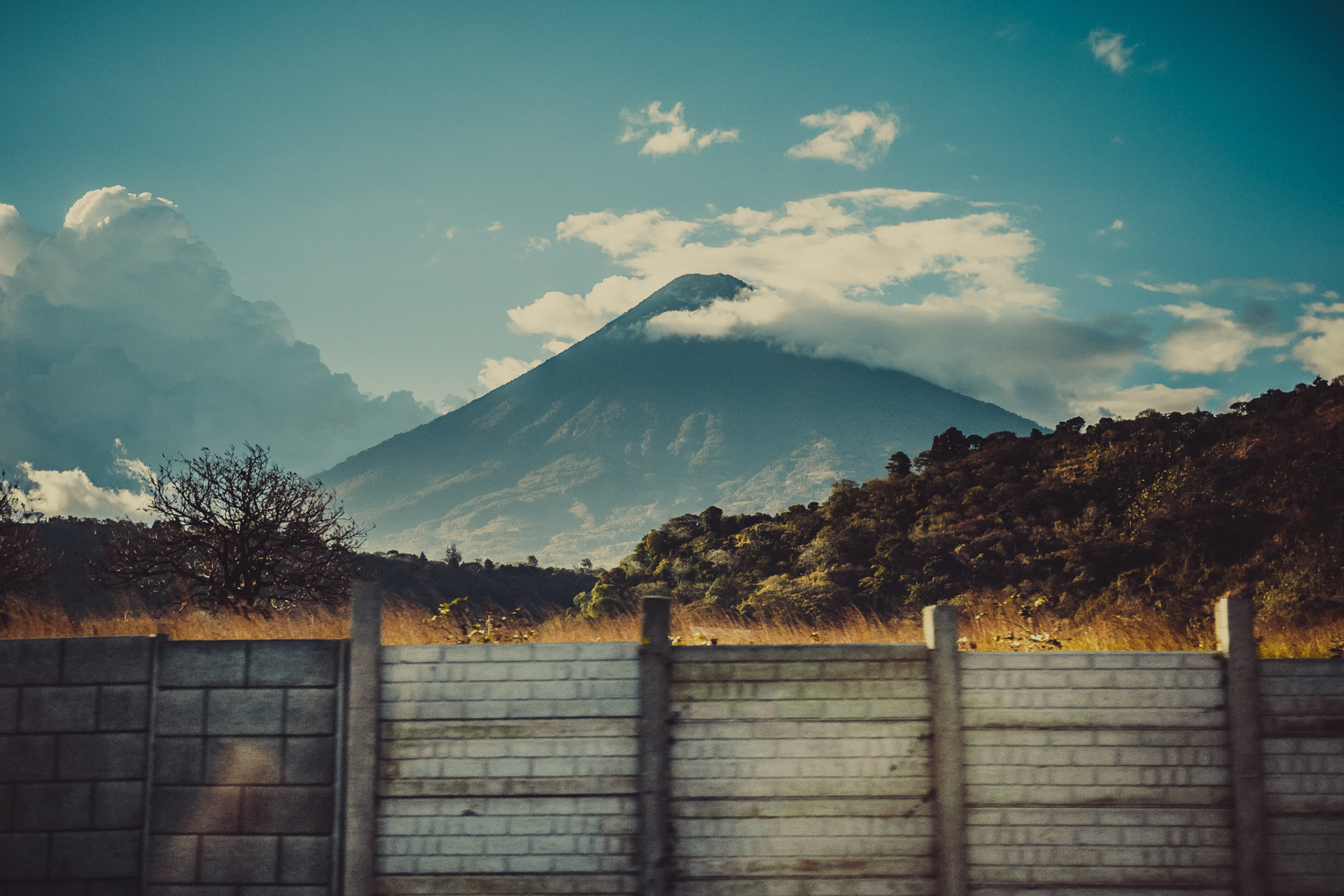 A view of an unidentified volcano from the highway leading out of Guatamala City.