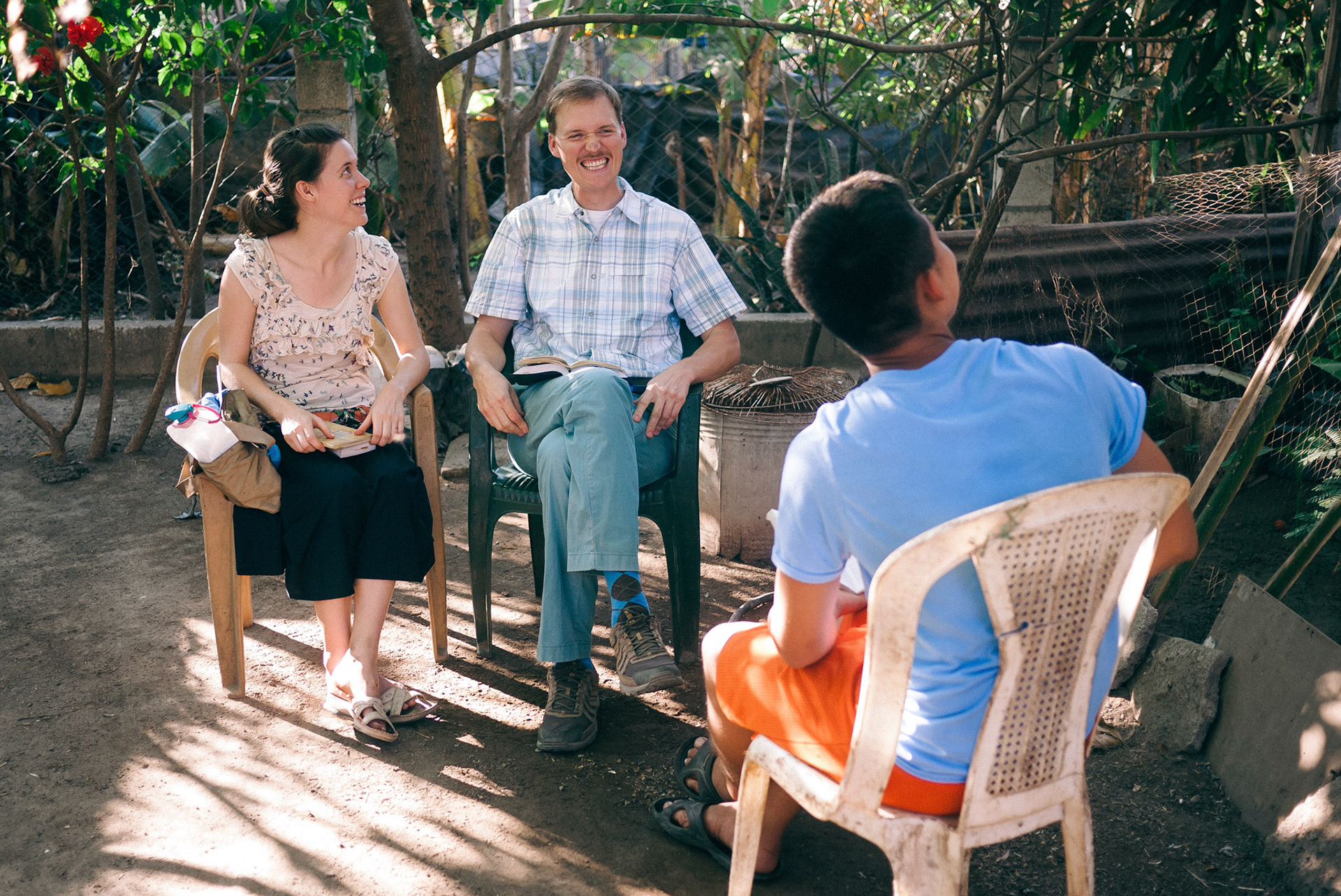 Tim & Kristy sitting down to study with Luis.