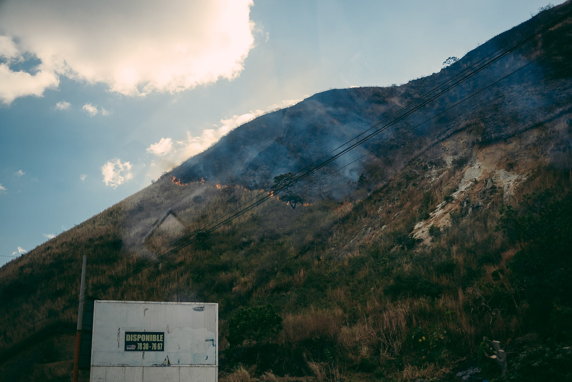 A large brushfire atop a mountain. Nathan told me that they regularly burn grass, and, as I would see later, trash throughout Guatemala.