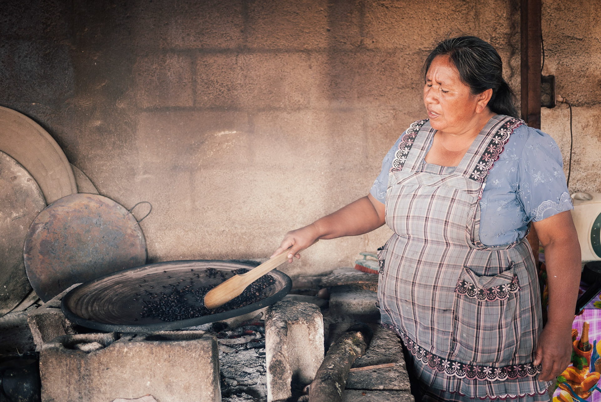 Don Filiberto's wife, dutifully roasting fresh beans.