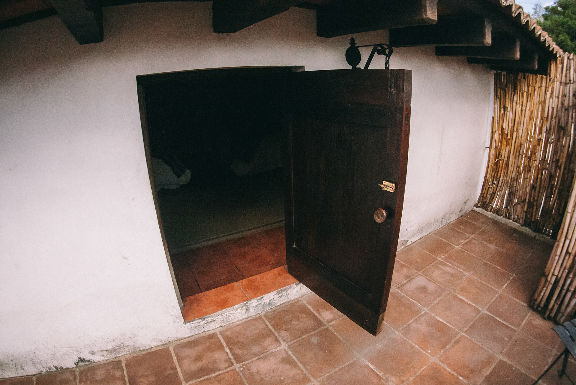 Alice in Wonderland-style tiny door to outside terrace.