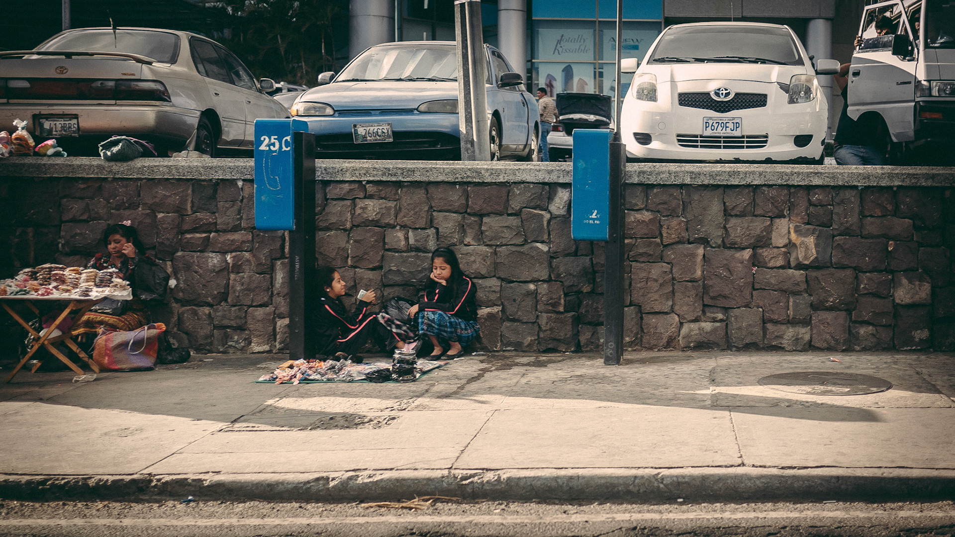 Sidewalks in the capital were lined with people trying to earn a few Quetzales from passers-by.