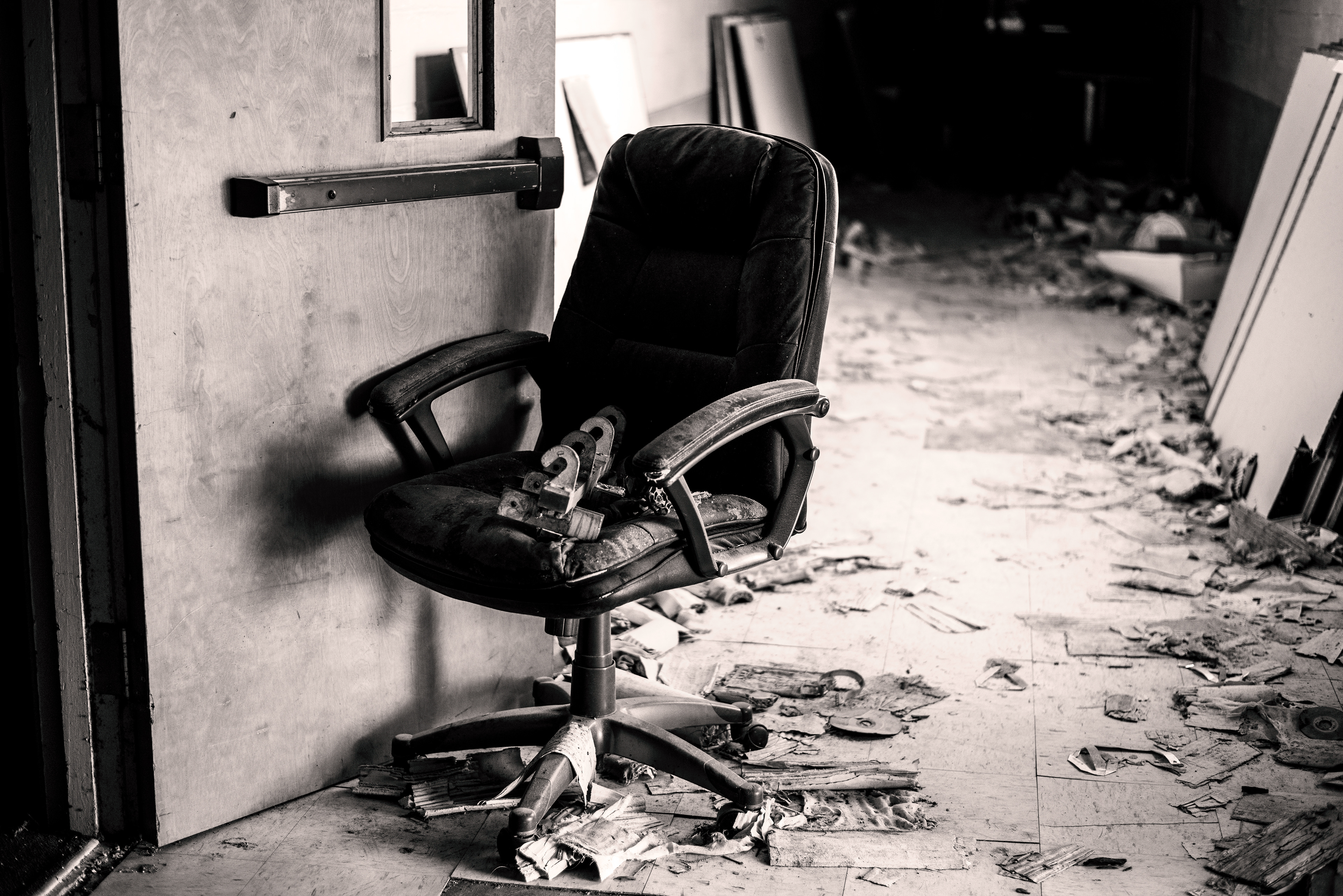 Desk chair amid destruction of hall