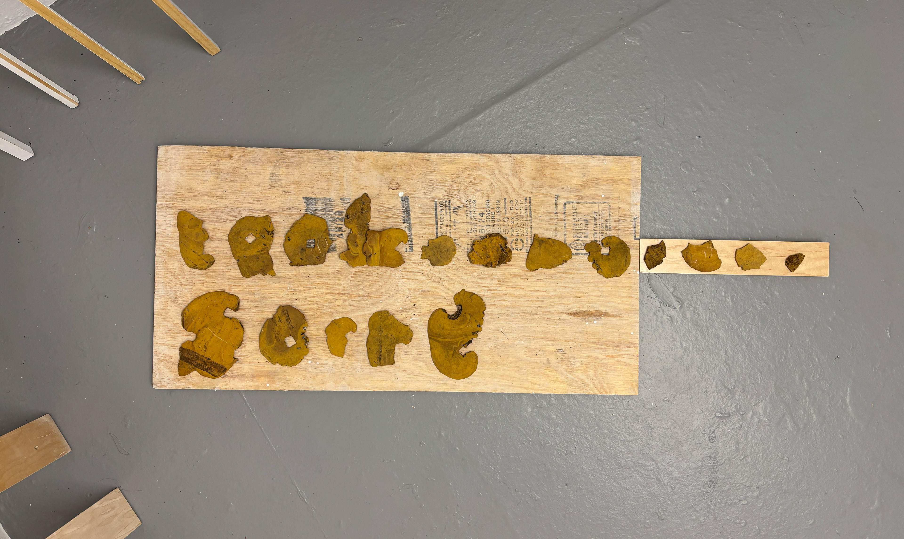 Mystery railroad trash on plywood