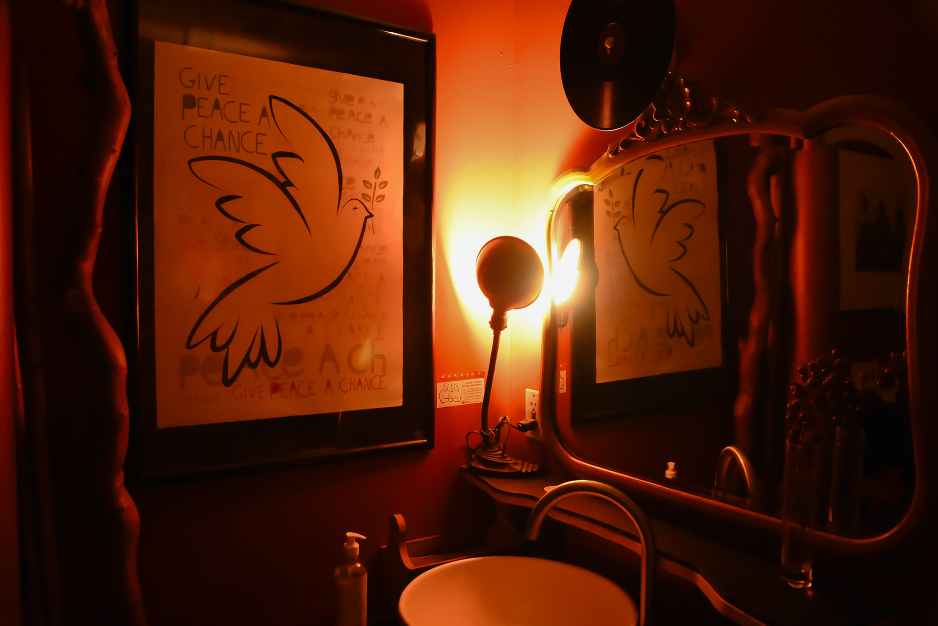 Give Peace a Chance, restroom Cafe Paloma, Seattle, WA