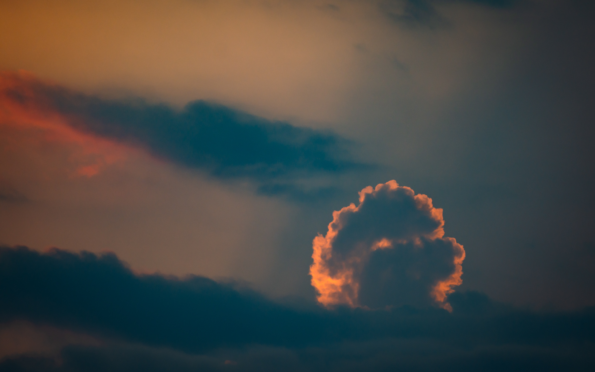 Evening sun highlights a cloud formation.  July 2026