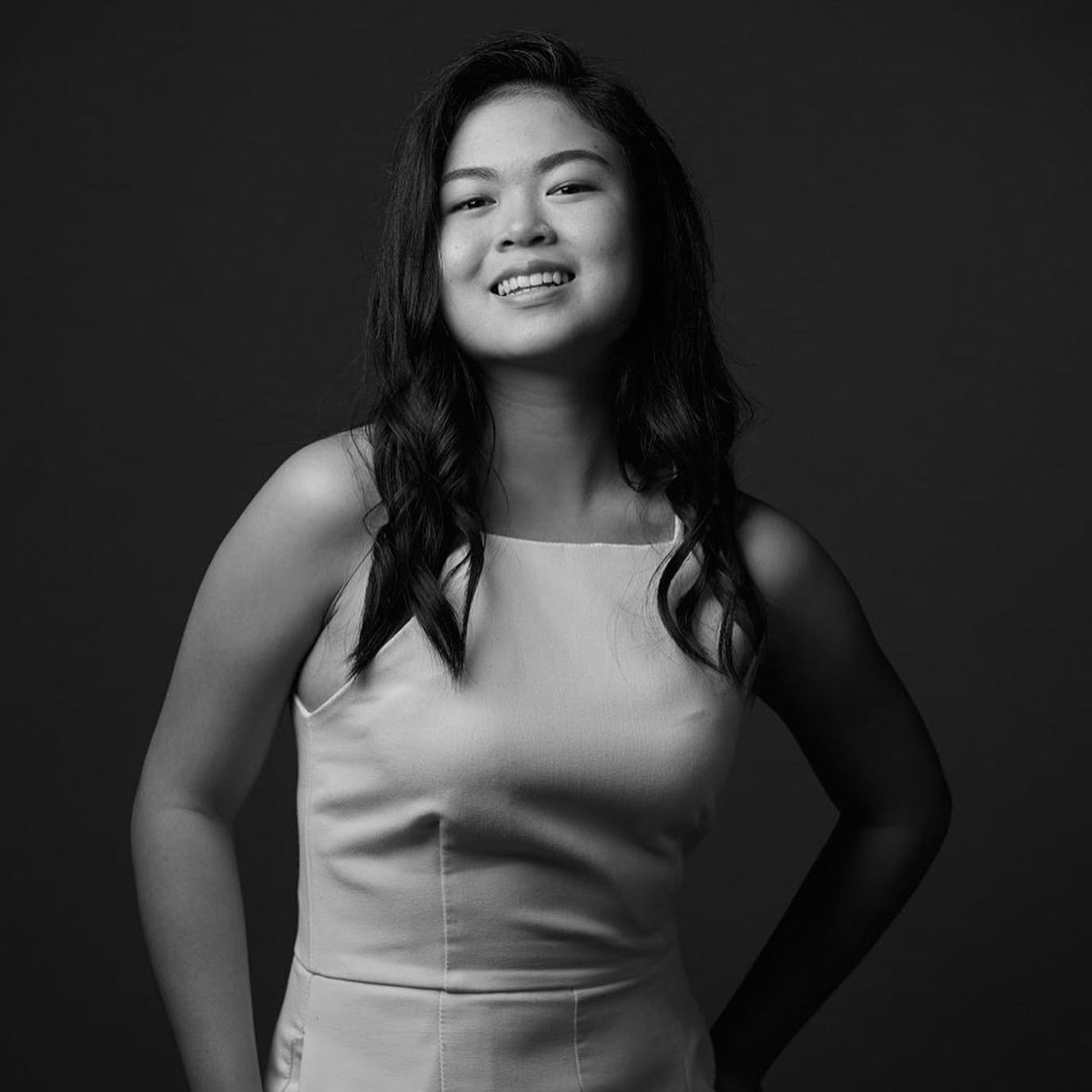 Kira Lim, 22, is a contemporary classical soprano under the tutelage of Ms Khor Ai Ming. She placed first for all categories (Classical/Folk/Opera) in the American Protege Vocal Competition 2018 and was later invited to perform at Carnegie Hall, New York City. She has also sung as a soloist in the Walt Disney Concert Hall, Los Angeles. In 2019, Kira graduated from Lasalle College of The Arts with a Diploma in Performance. In 2016, she attained a Distinction in the Trinity College London Advanced Performance Certificate. Kira was involved in the 2019’s SIFA production of Oreste by Ifigenia directed by Tan Shou Chen. In 2020, Kira was accepted into the prestigious Manhattan School of Music in New York City to pursue her Bachelors in Music (Classical Voice). She has performed several times with many established conductors including - Joshua Tan, Alice Farnham, Tsung Yeh and Justin Freer on a range of large works for chorus and orchestra, including Berstein’s Chichester Psalms, John Rutter’s Mass of the Children, Howard Shore’s music for Lord of the Rings and Liu San Jie - Musical Film Concert. Kira has a love of sharing and teaching the arts. Kira started teaching singing in 2017 at Ms Khor’s Studio and has worked with people of all ages and backgrounds. In 2019, she also taught singing and piano in SOMA and Joy Music Studio. In late 2020, she was invited to be a voice coach in the arts camp “我爱秀 I SHOW” with Singapore Raffles Music College for children and teenagers. Kira served as an assistant instructor to The Lighthouse School Choir which performs regularly with The Purple Symphony led by Mr Quek Ling Kiong. Kira is the main storyteller in PlayINC’s The Classics Retold, telling fairy tales but also bringing up issues that children may face today. She wants to continue inspiring young children to be imaginative, creative and chase their dreams. Kira has participated in some notable performances including: The Magic Flute (2014) as 'First Lady', Hansel and Gretel (2016) as 'Gretel', Mass of The Children and New York Sounds of Summer, Carnegie Hall (Soloist, 2016), Vocal Associates Songbirds Recital: Tsubasa (Soloist, 2017), You are the Music (Soloist, 2017), Rachmaninoff Piano Concerto No.2 & Mass of the Children (Soloist, 2018), Los Angeles International Music Festival (Soloist, 2018), Carmina Burana (Soloist, 2019), StoryFest - Wings Of Love (Storyteller, 2019), Der Zwerg with the Opera People directed by Edith Podesta (2019) as ‘First Maiden’. In November 2019, Kira did a solo debut recital at the Esplanade Recital Studio, and she hopes to continue performing annually as she grows artistically.