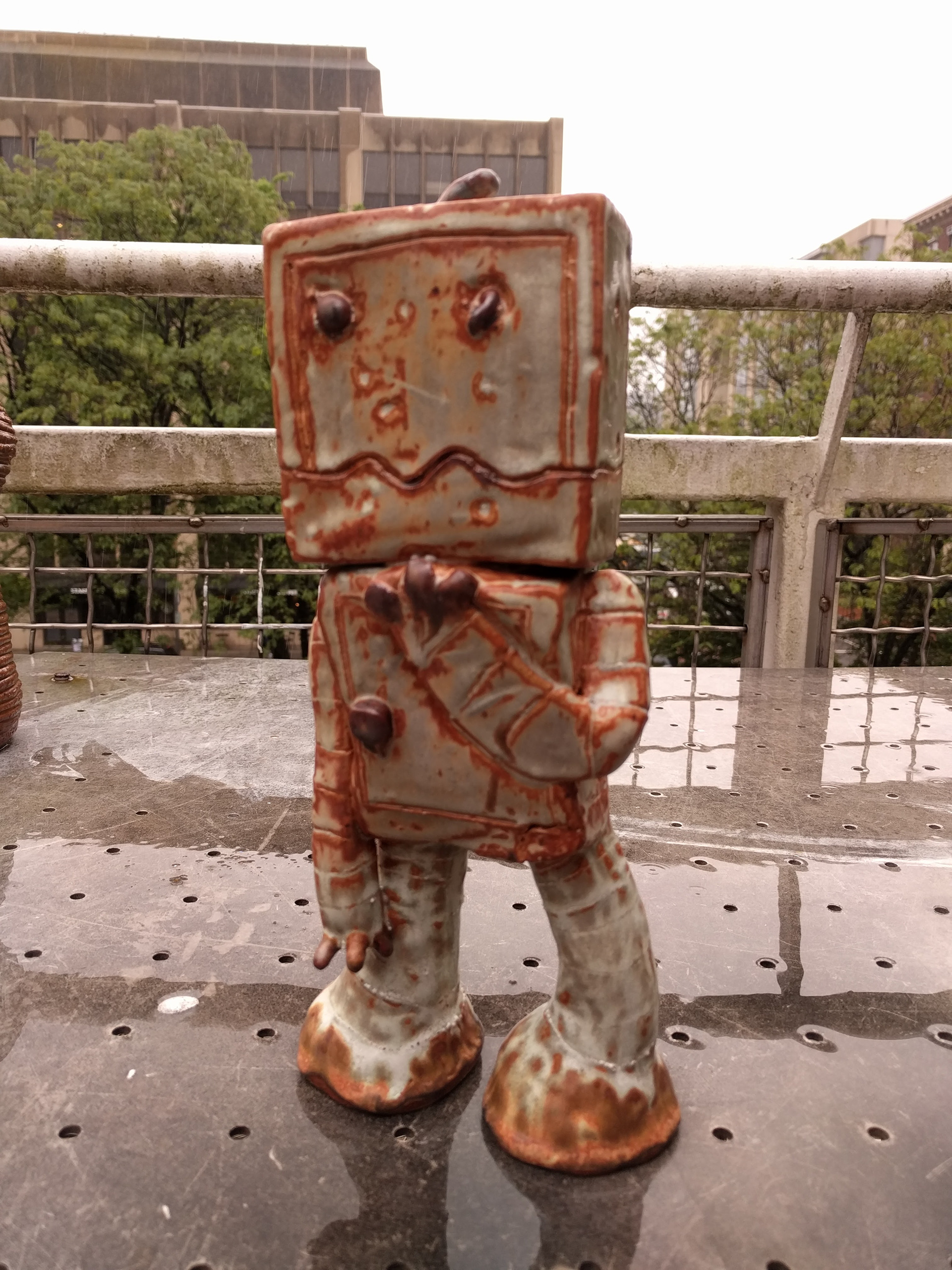 Enter Dot the Robot. It somehow found ways to break itself while I was building it! It felt natural to add some clumsy style to it.