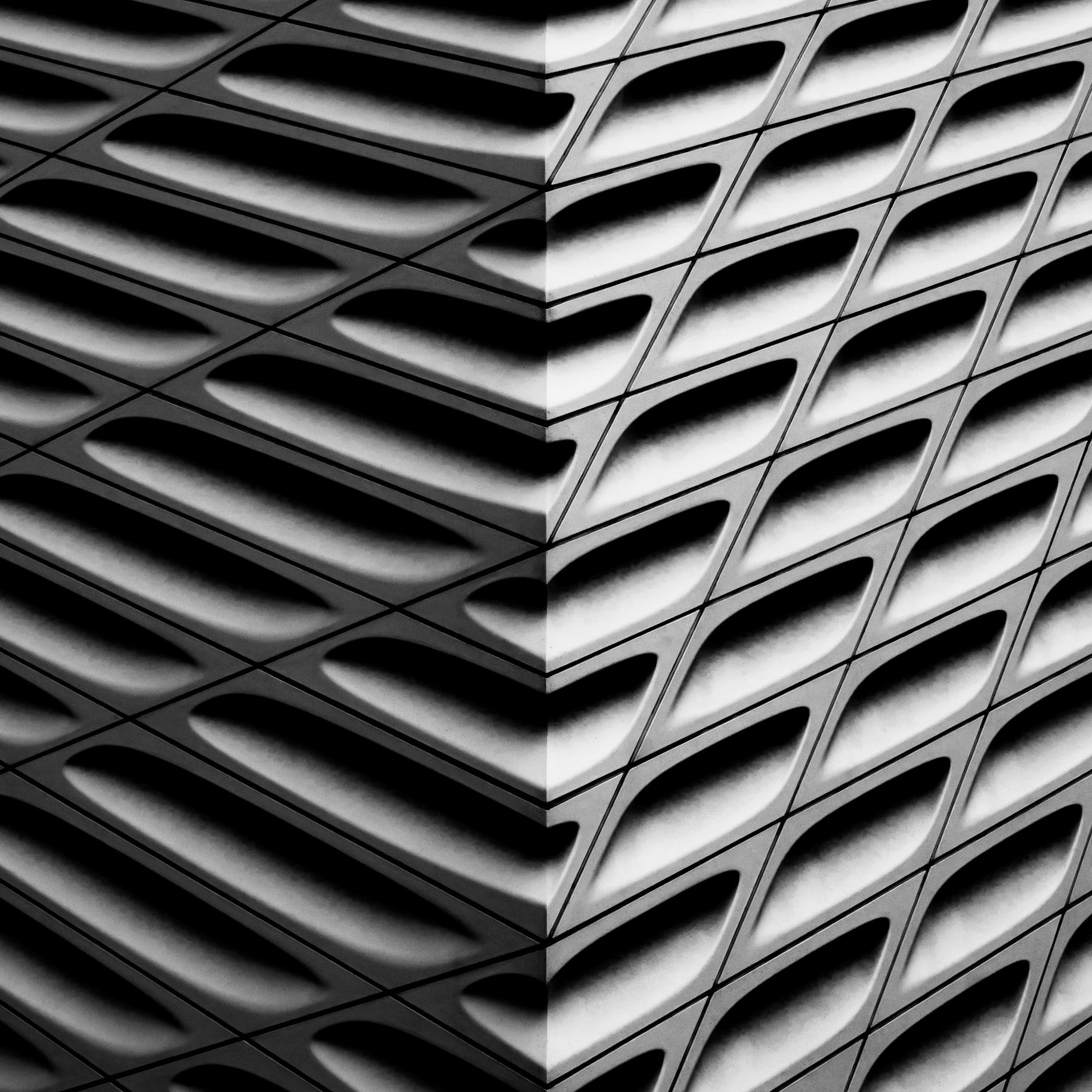 A corner of the abstract exterior of The Broad contemporary art museum in downtown Los Angeles