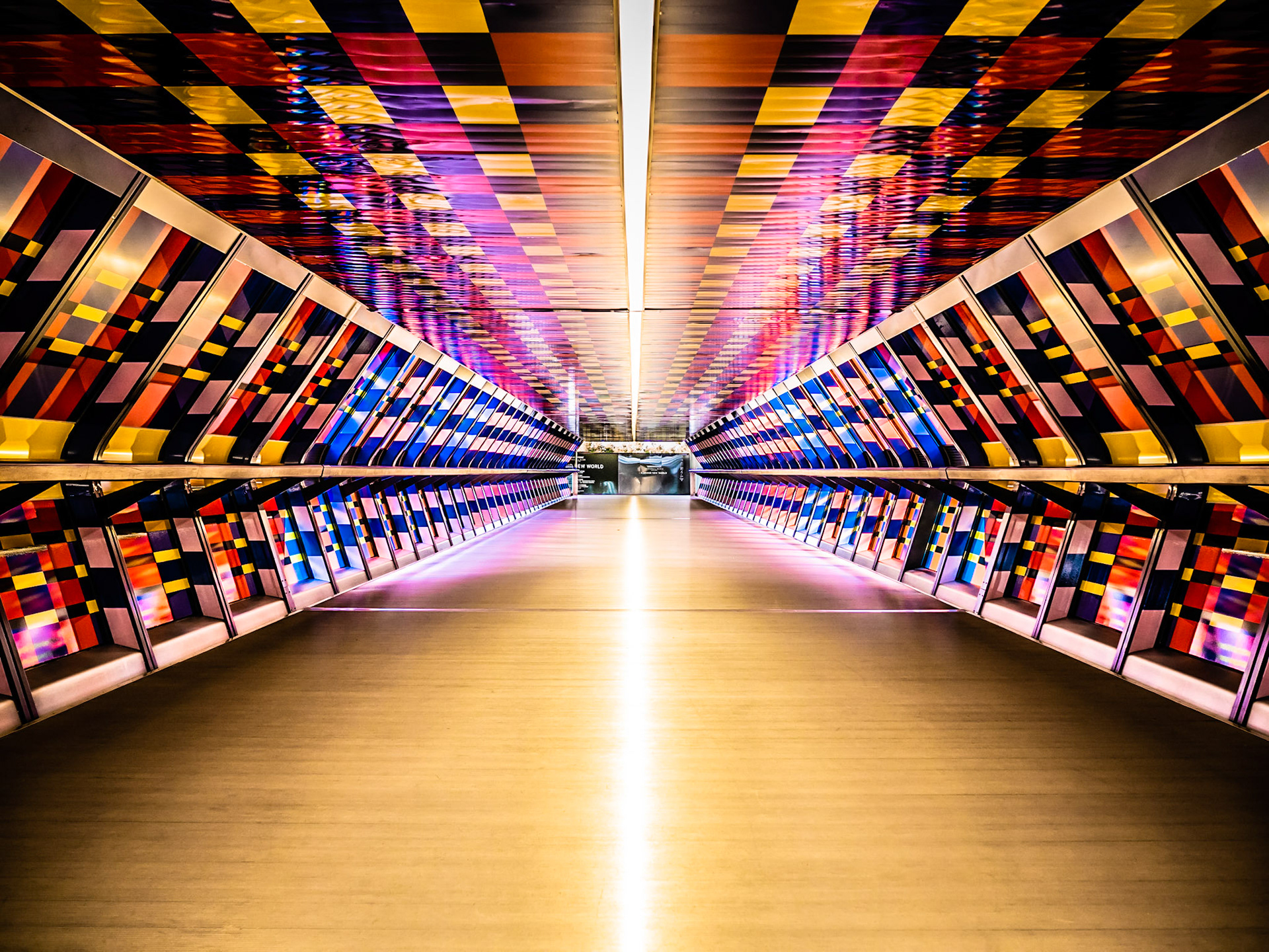 Contemporary art adorns a footbridge in London's Canary Wharf