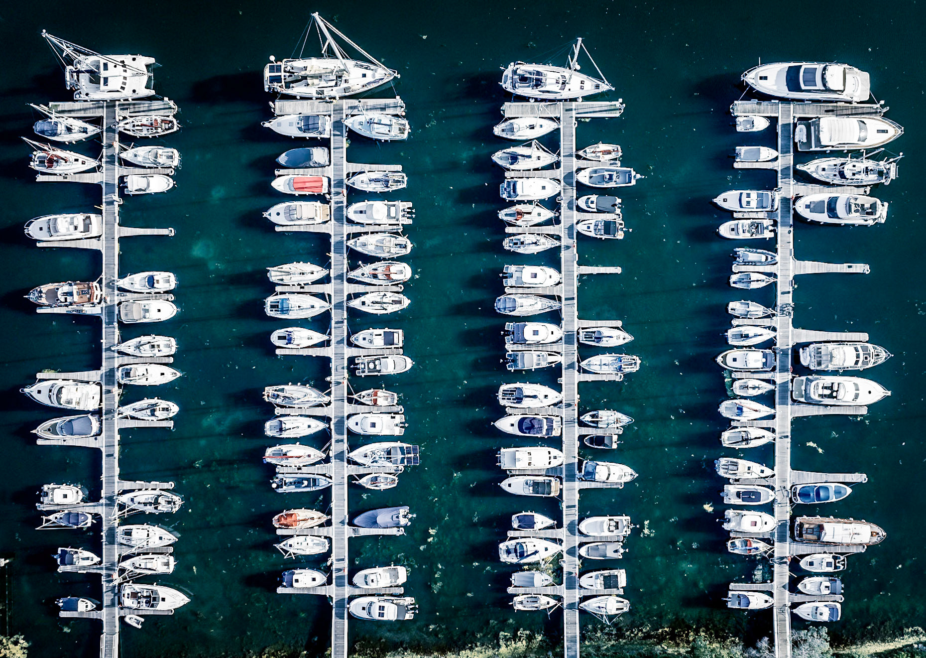 Yachts nestle in their moorings in a marina on the south coast of England