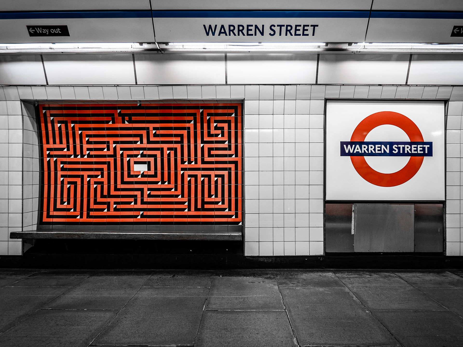 Distinctive artwork on the platform of Warren Street tube station in London