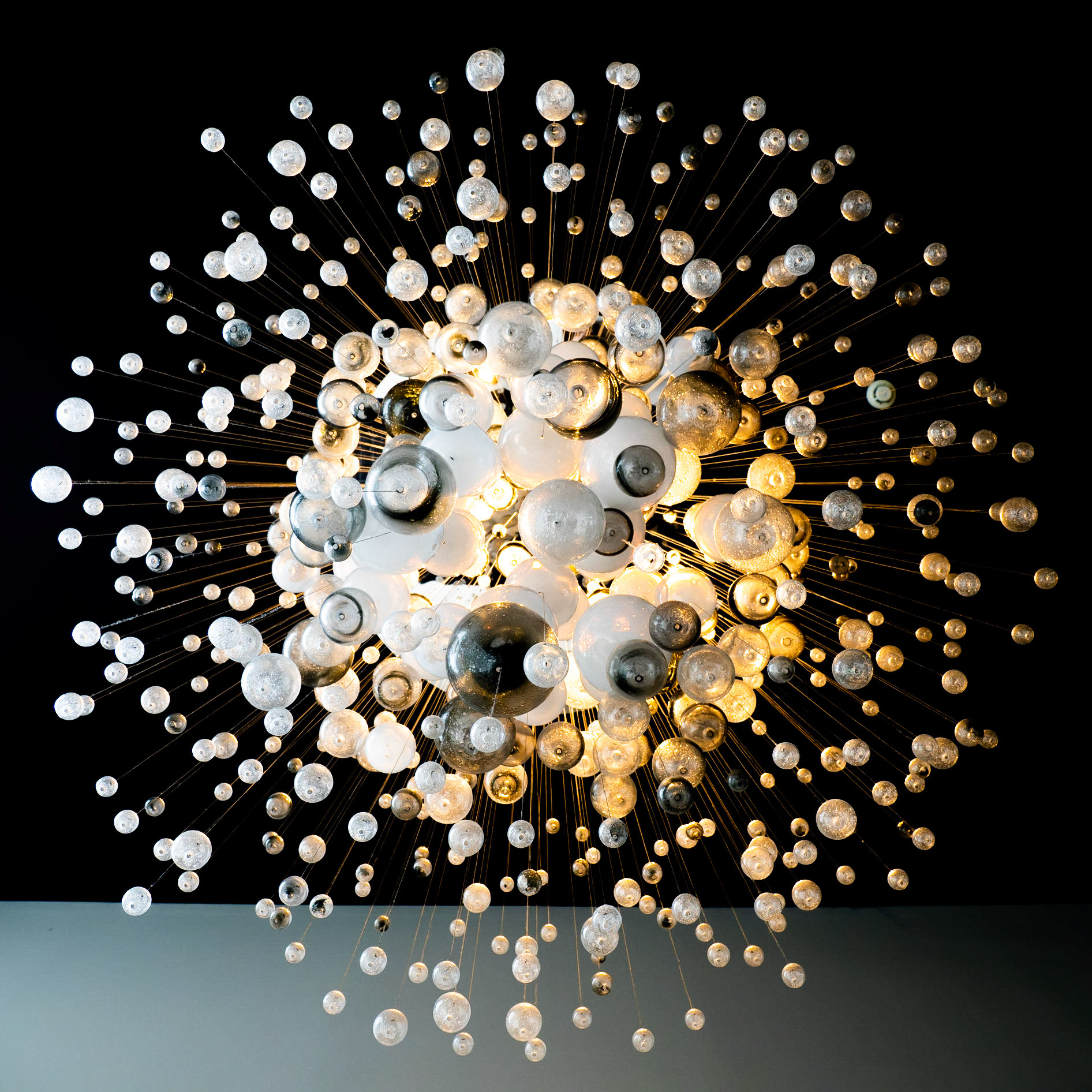 A stunning collection of glass orbs forms a beautiful contemporary art installation