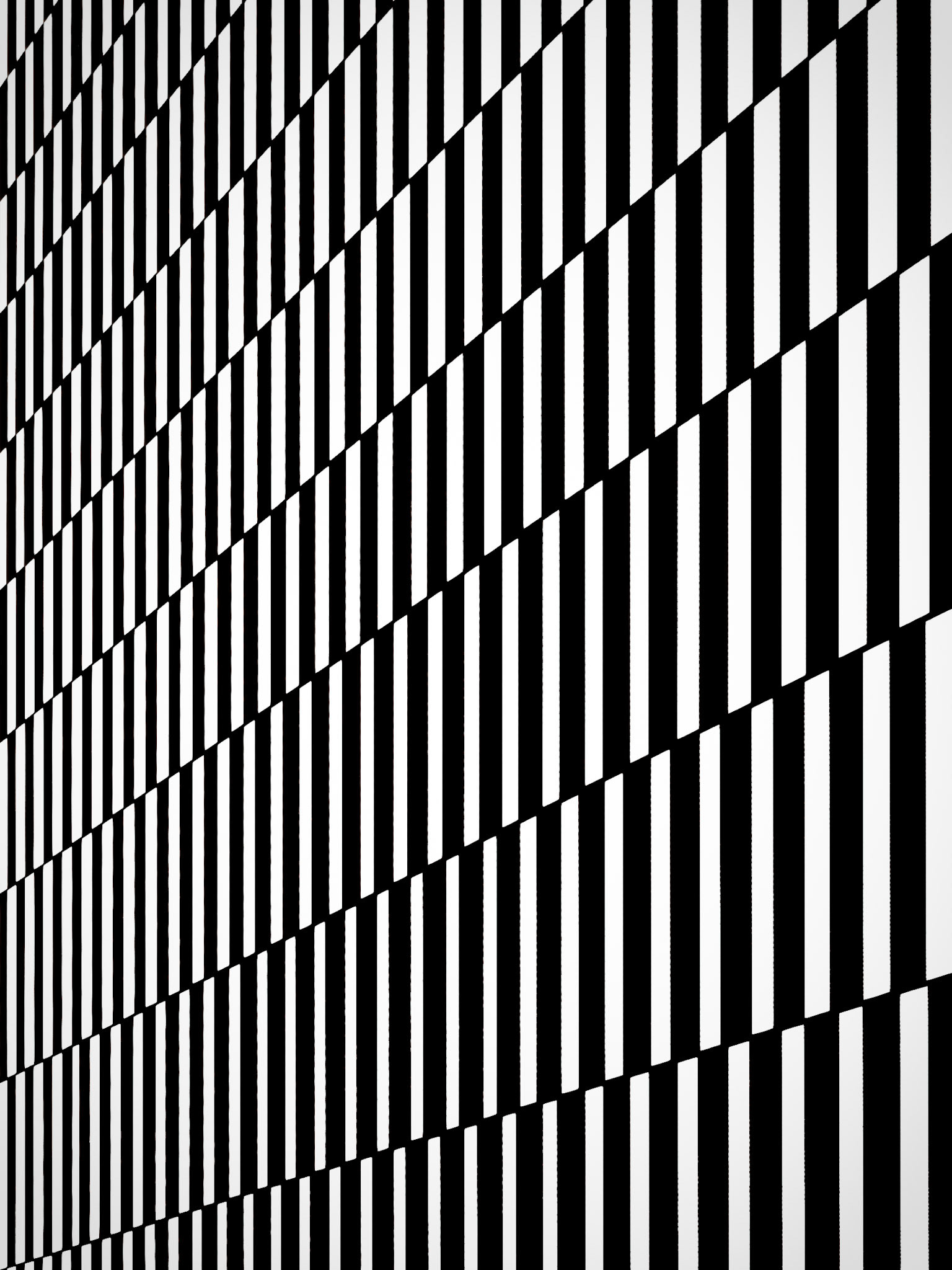 Bright sunlight reflecting off the windows of a skyscraper create a hypnotising pattern in New York's Hudson Yards