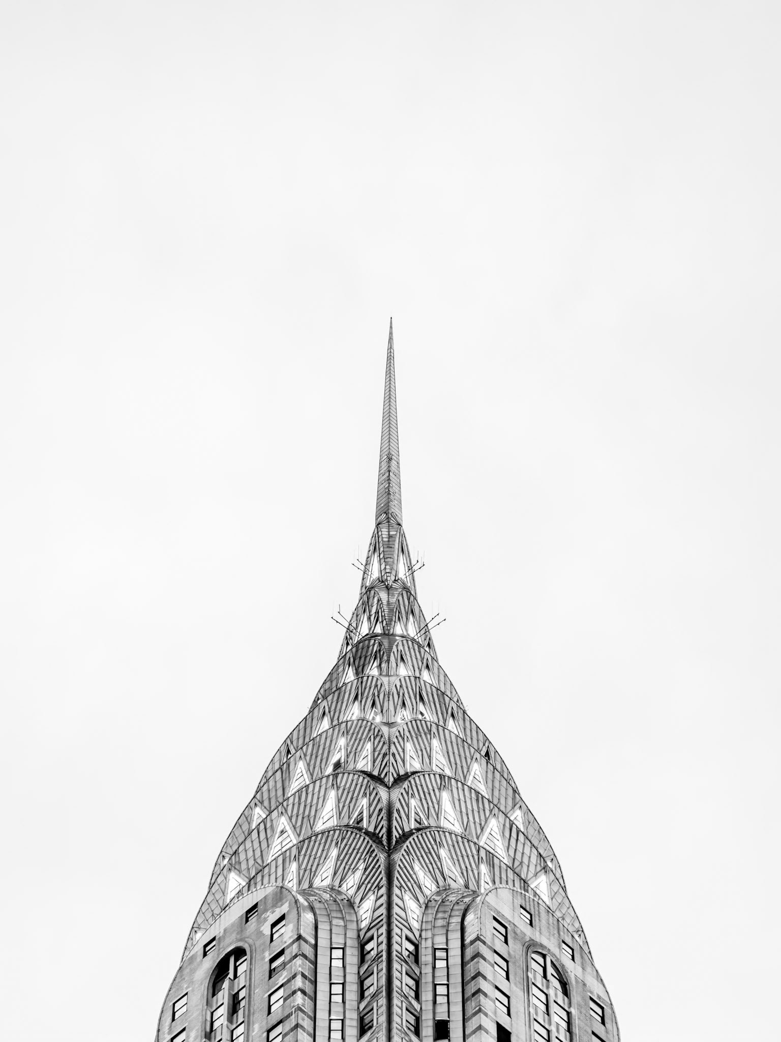 The intricate architecture of the Chrysler Building at dusk in Manhattan, New York