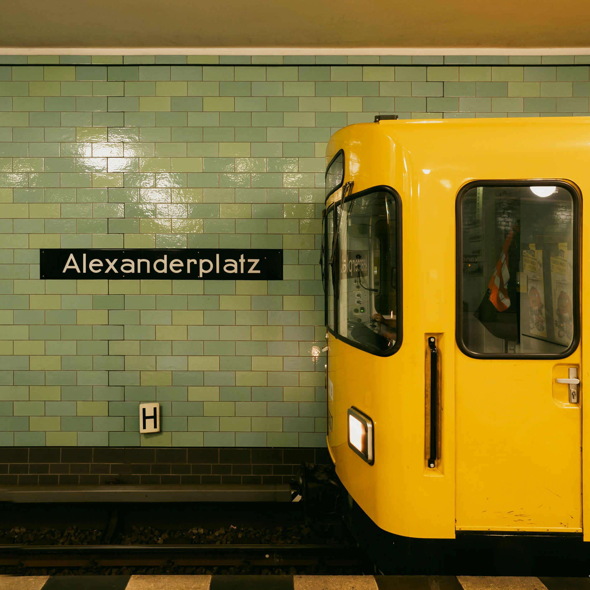 A U-Bhan train waits for passengers to board in Alexanderlatz station in Berlin