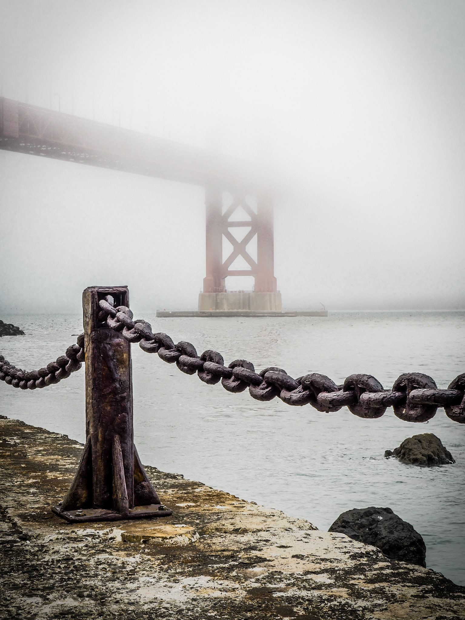 Fog shrouds the Golden Gate Bridge in San Francisco